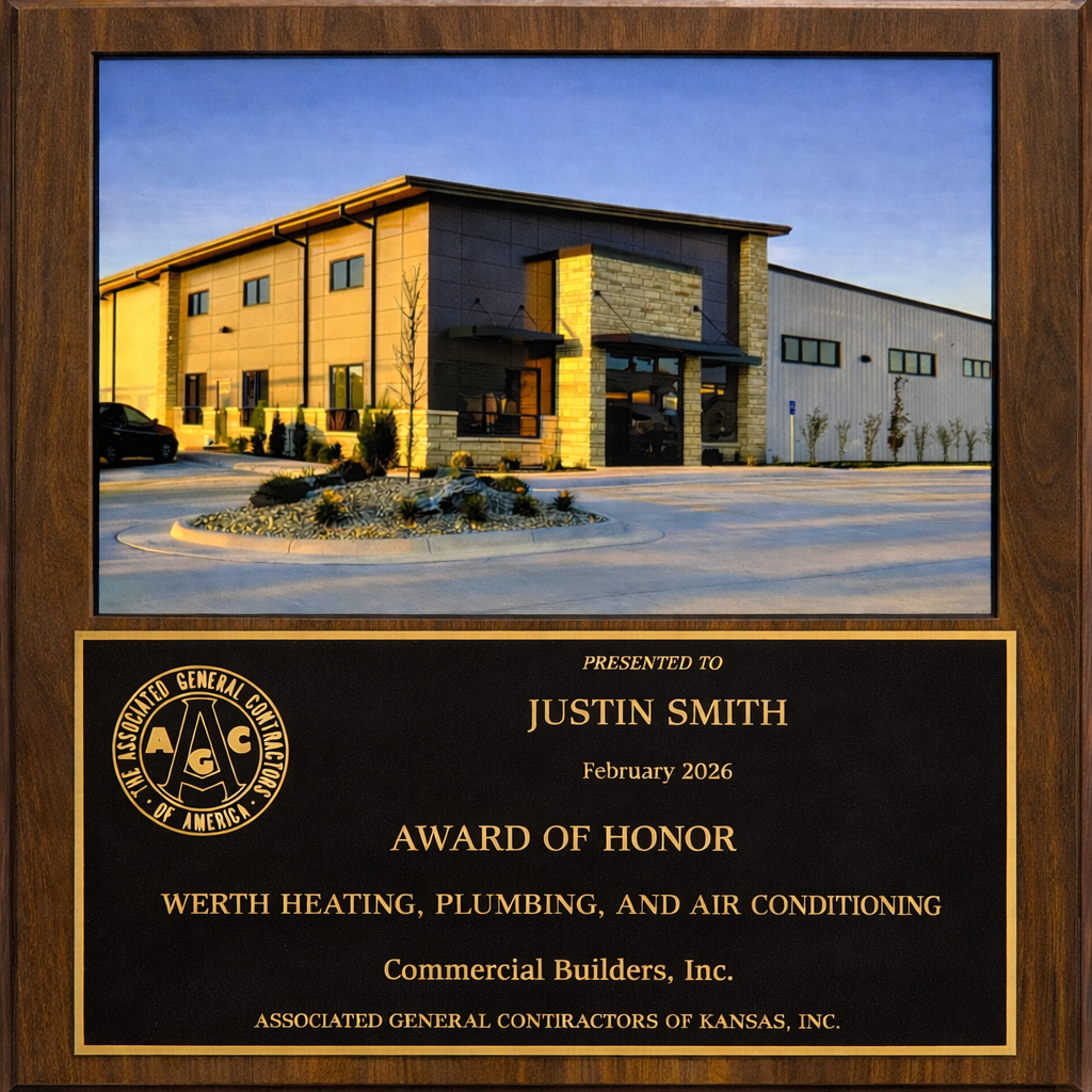 Commercial Builders of Hays was honored by the Association of General Contractors at its recent awards banquet for its work on Werth Plumbing's new building on 13th Street. Courtesy photo