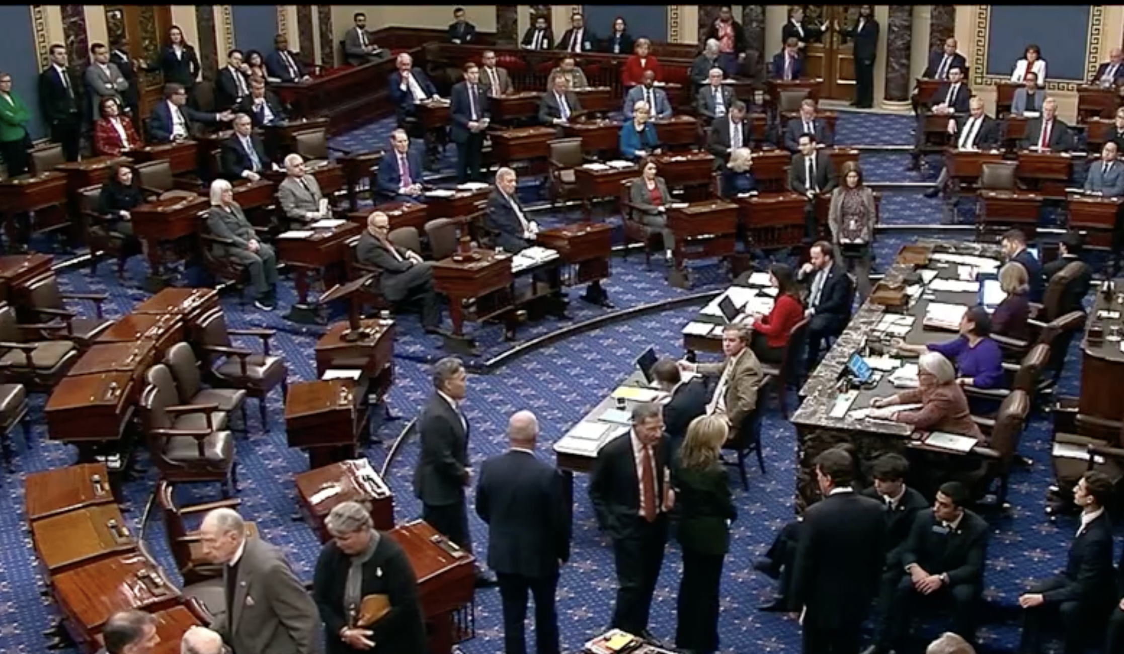 Underscoring the gravity of the moment, Democratic senators filled the Senate chamber and sat at their desks as the voting got underway. Typically, senators step into the chamber to cast their vote, then leave.