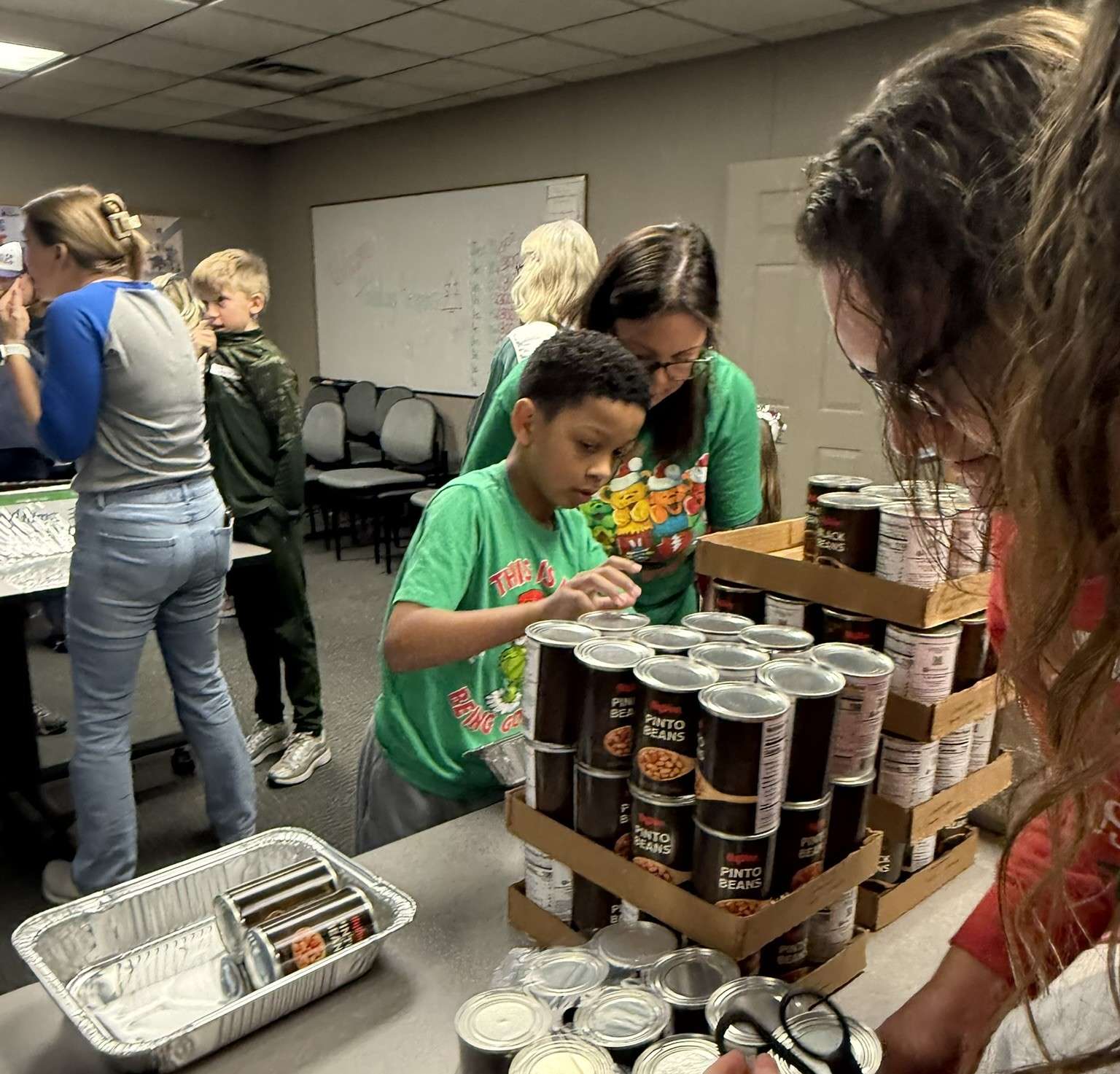 Volunteers pack ready to go meal kits during the United Way of Greater St. Joseph's Caring Connections Crew.&nbsp; United Way is seeking volunteers to help with the Caring Connections crew with three days coming up in March/ Photo courtesy of United Way of Greater St. Joseph