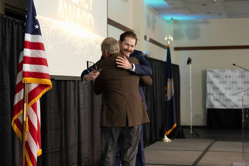 Mark with his son, Taylor. (photo by Brandon Steinert)