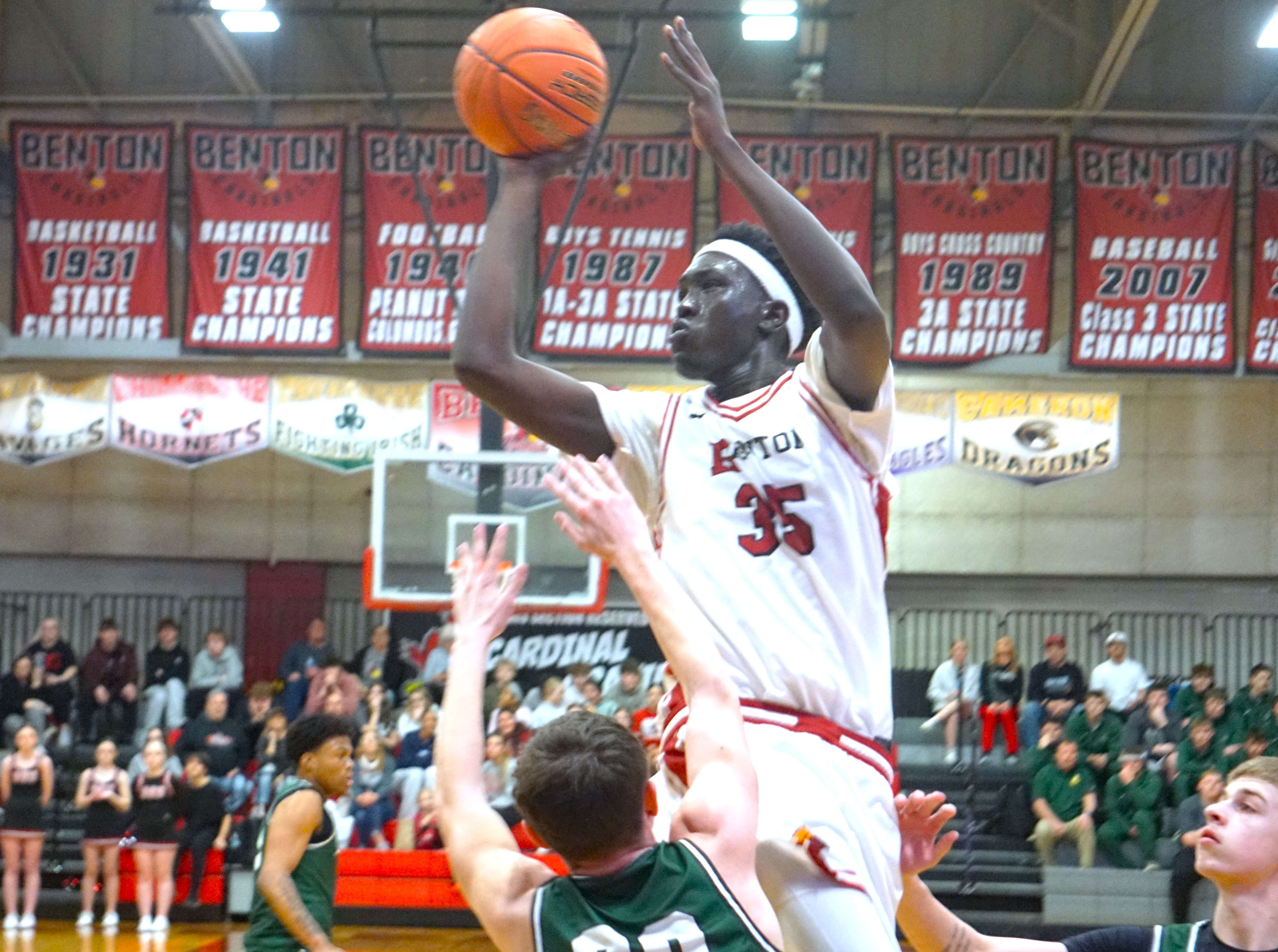 Mach Mayom goes to the rim for a shot/ Photo by Matt Pike