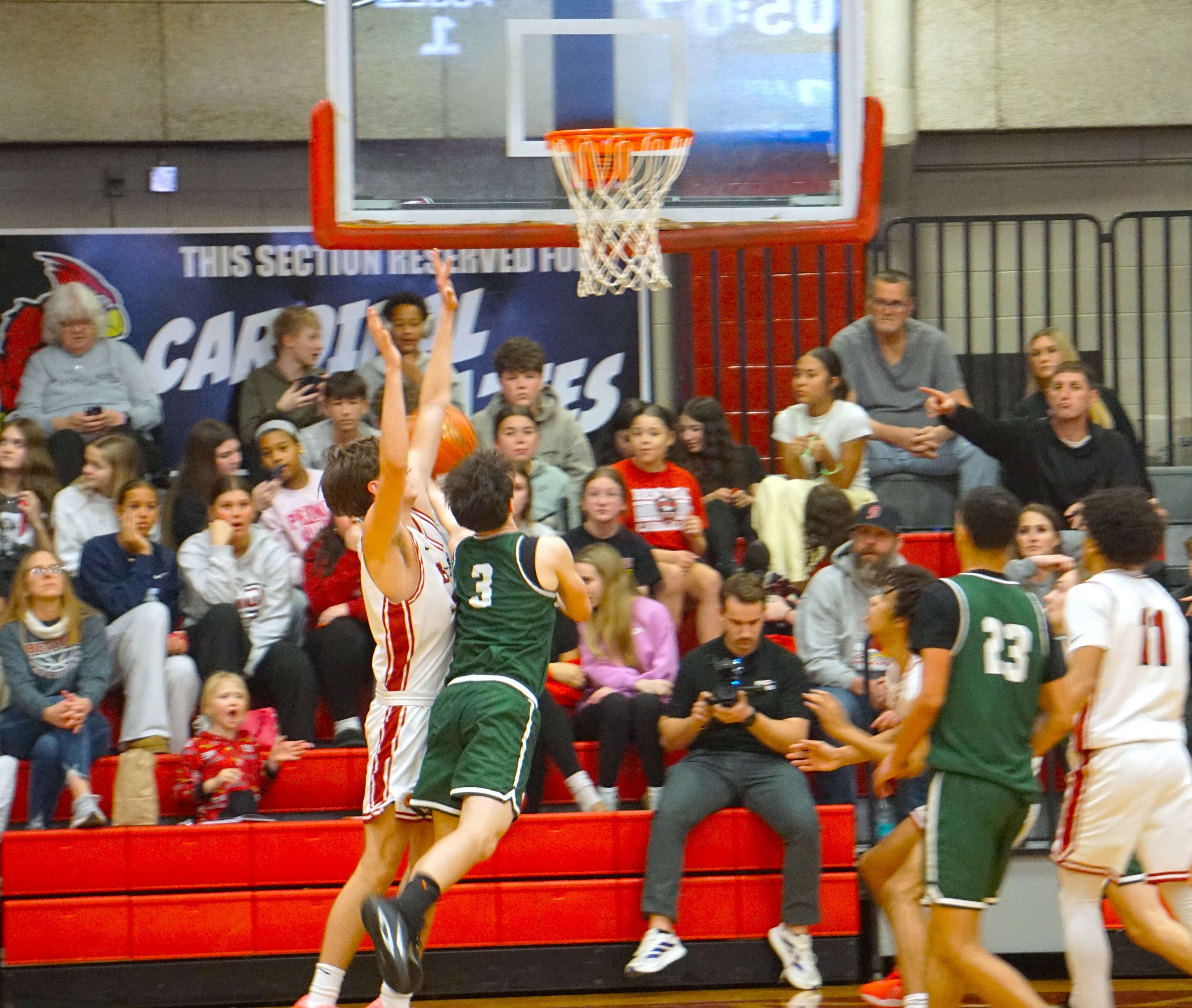 Maxton Pucket leans in for a layup/ Photo by Matt Pike