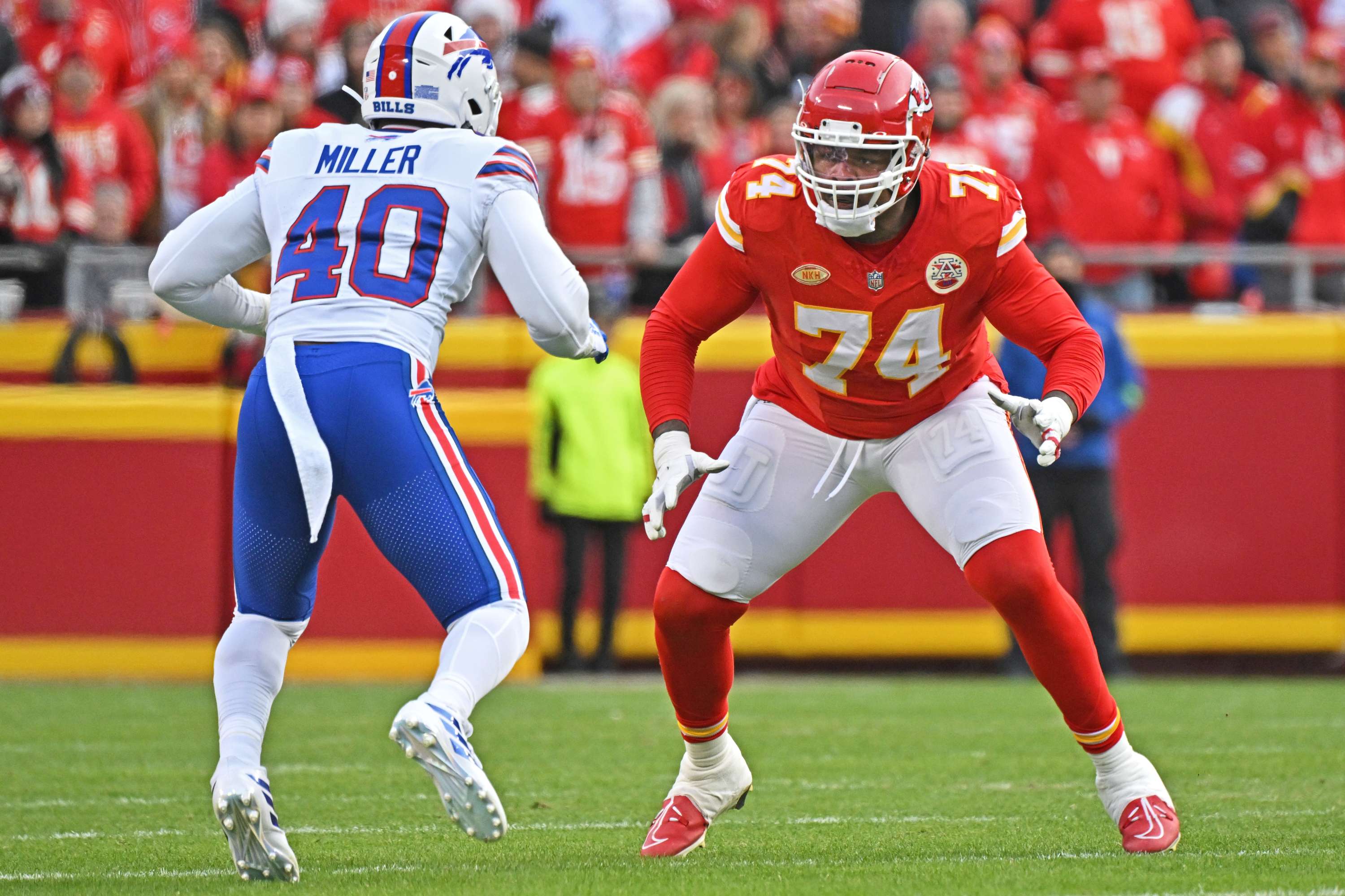 FILE - Kansas City Chiefs offensive tackle Jawaan Taylor (74) gets set to block Buffalo Bills linebacker Von Miller (40) during an NFL football game, Dec. 10, 2023, in Kansas City, Mo. (AP Photo/Peter Aiken, File)
