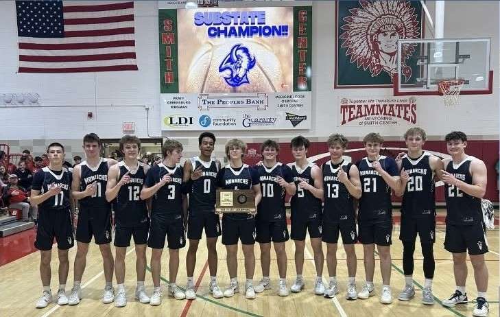 The TMP-Marian boys basketball team poses with their Sub-State championship trophy after winning the Smith Center Sub-State on Saturday March 7, 2026 in Smith Center, Kan, (TMP-Marian photo)