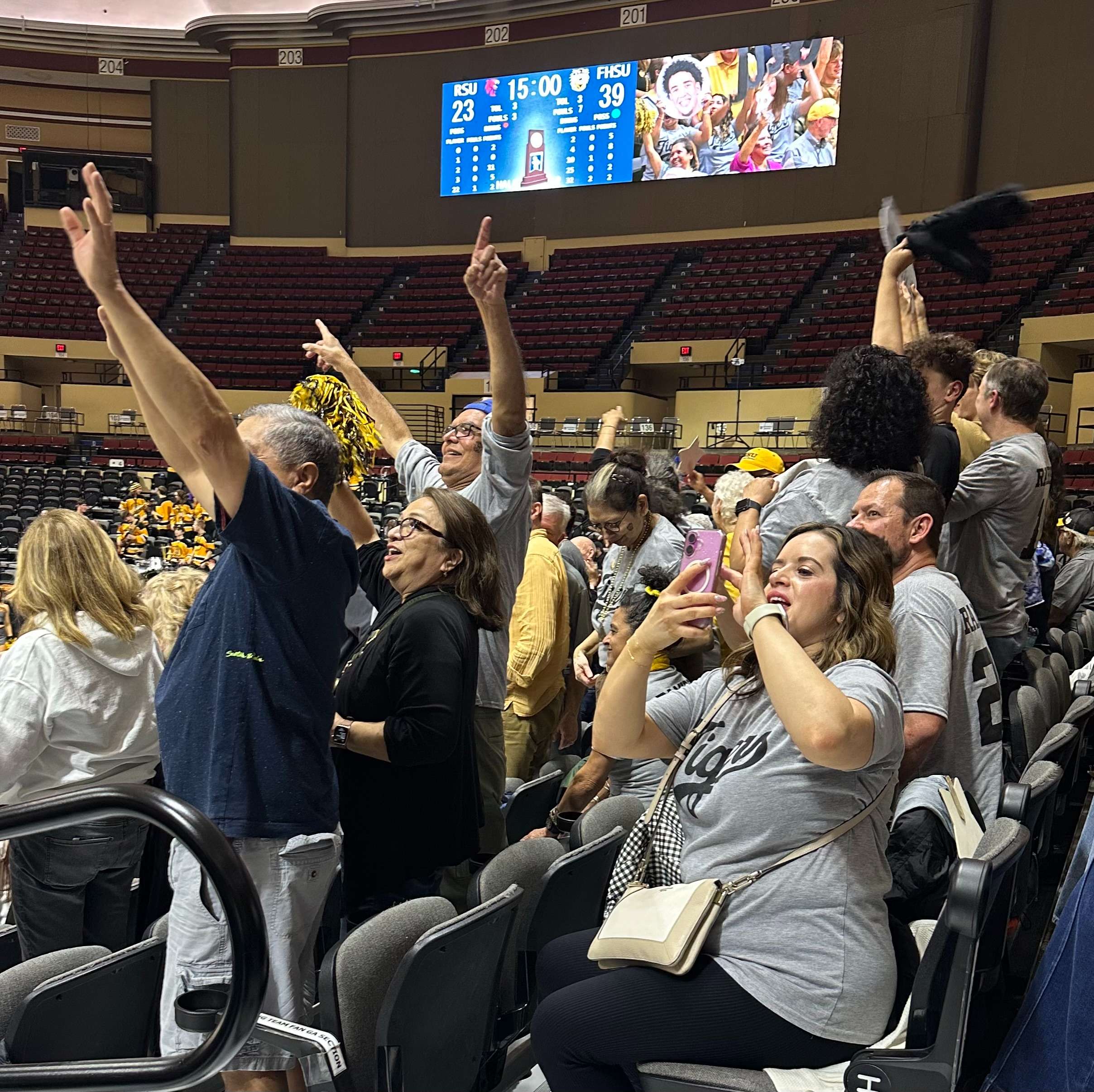 The Ramirez family cheers during Fort Hays State's game vs. Rogers State (Hays Post photo/Diane Gasper-O'Brien)