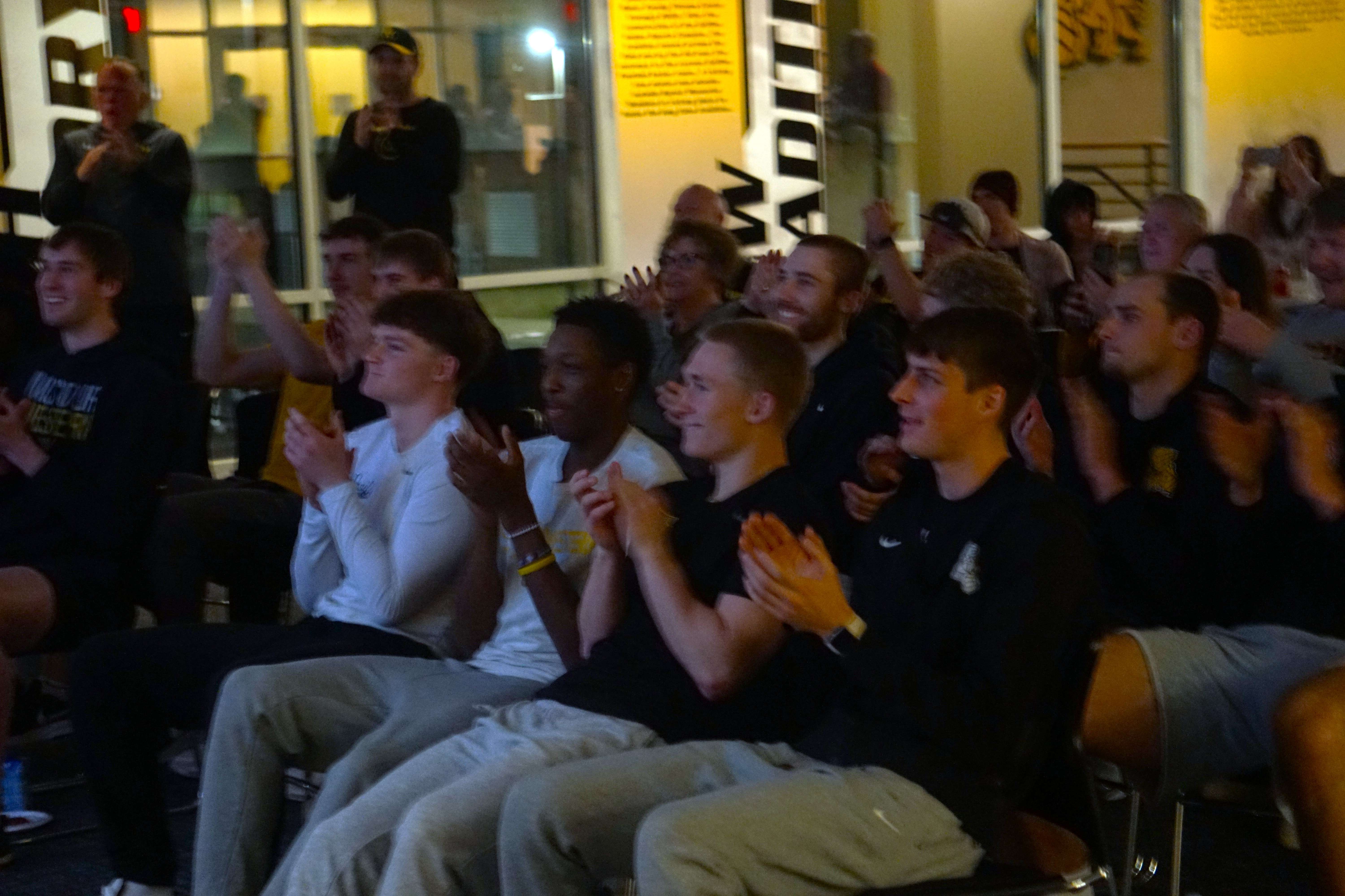 The MoWest men's basketball team celebrates their berth into the NCAA Division II tournament/ Photo by Matt Pike