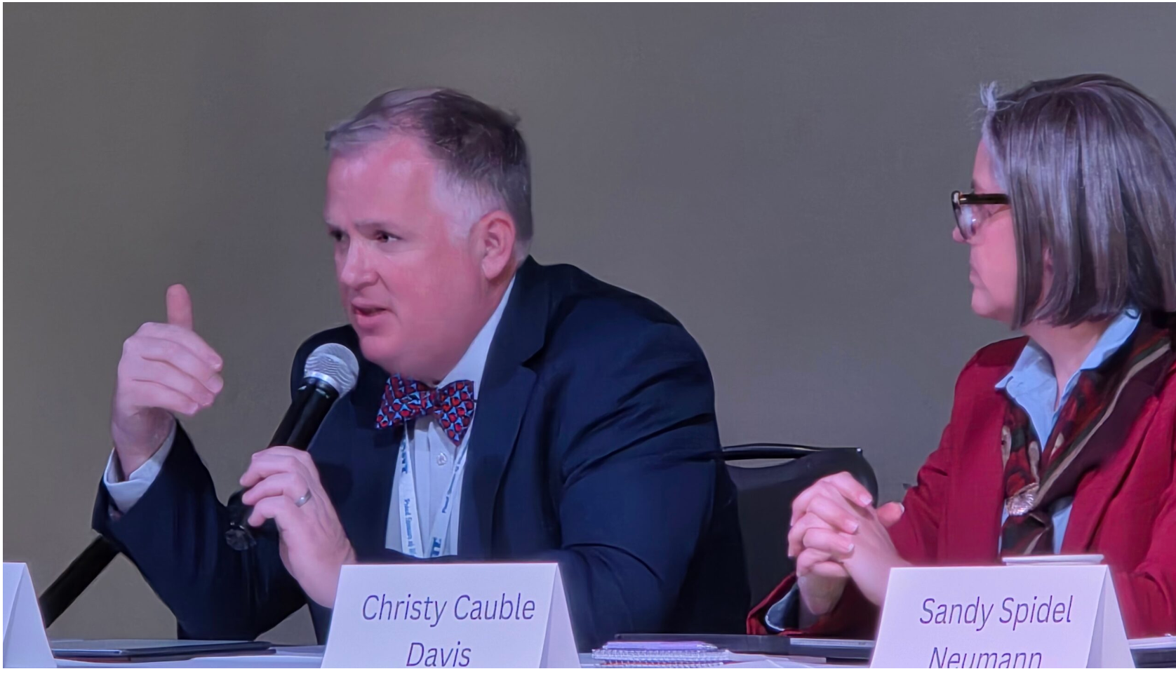 Democratic candidate Jason Hart, an assistant U.S. attorney, shares his thoughts on what needs to happen in Washington, D.C., at the Kansas Democratic Party’s annual convention March 8, 2026. (Photo by Morgan Chilson/Kansas Reflector)