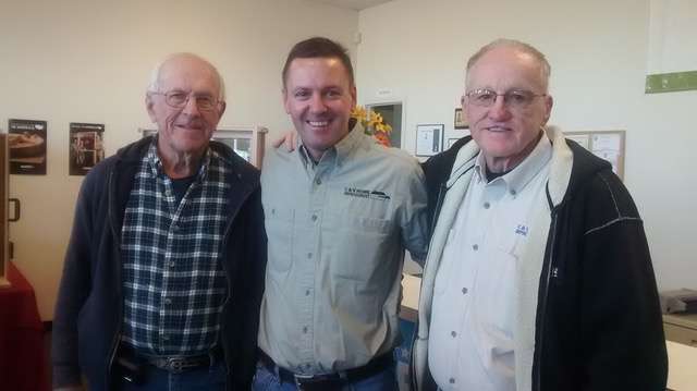 Representing the past, present and future of C&amp;V Kansas Doors, from left to right, are Larry Vogt, Matt Hoisington and the late Dennis Carson. The company is observing its 50th anniversary this year.