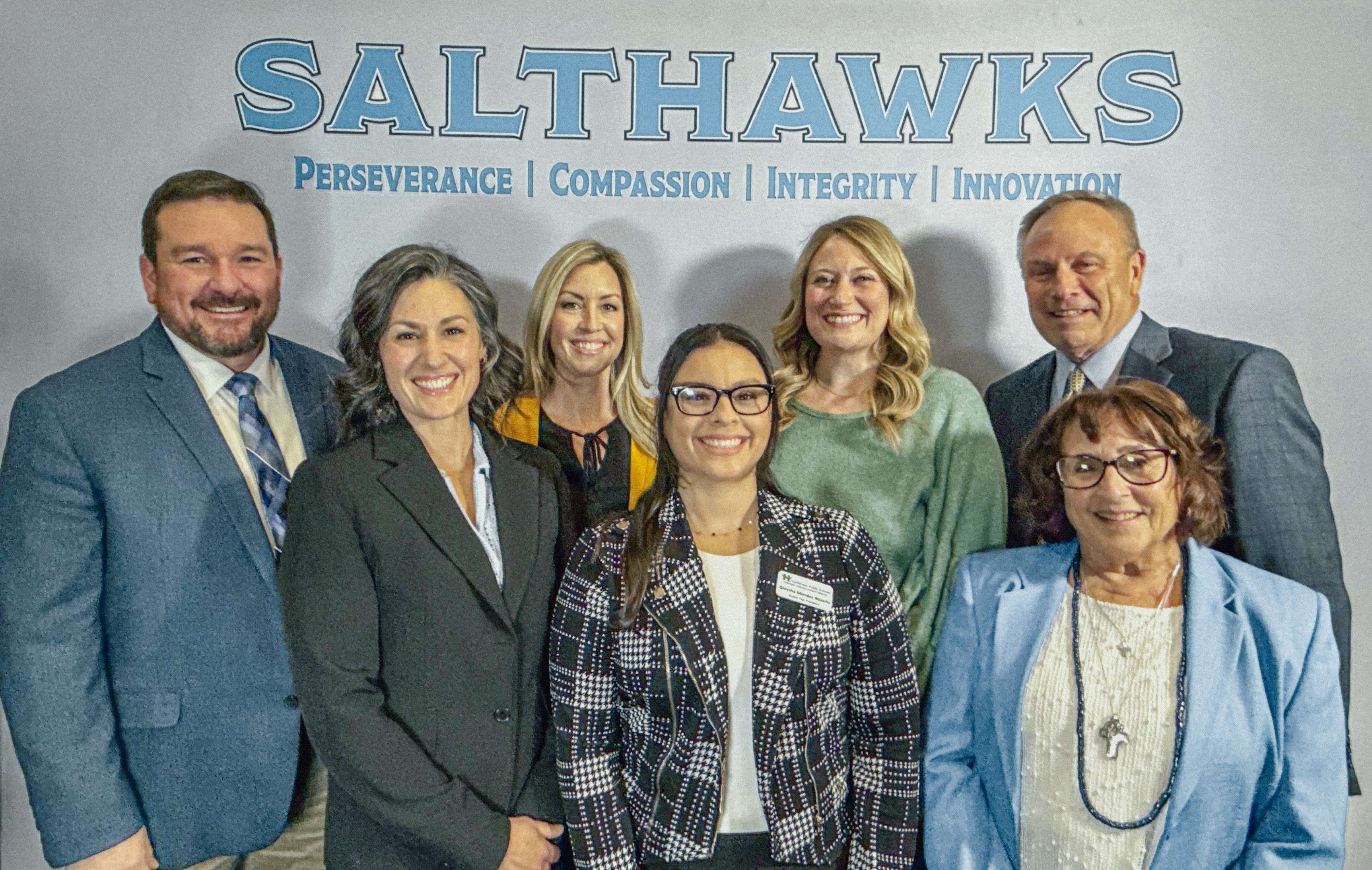(L-R) Back Row: Lance Patterson, Lindsey Hatfield, Darcie Canfield-Riggs, Tad Dower  Front Row: Laura Corey, Gleysha Mendez-Rosario, Cheryl Thompson (Photo courtesy USD 308)