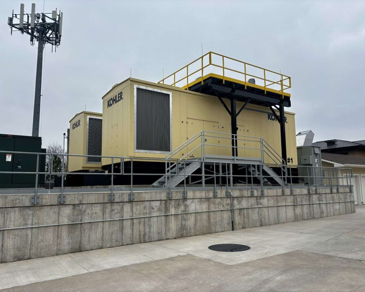 Two new diesel generators that create zero emissions. A third generator at Akers Energy Center is older, but it is a 2,300-horsepower unit that burns 100 gallons of diesel per hour. Photo by Tony Guerrero/Hays Post