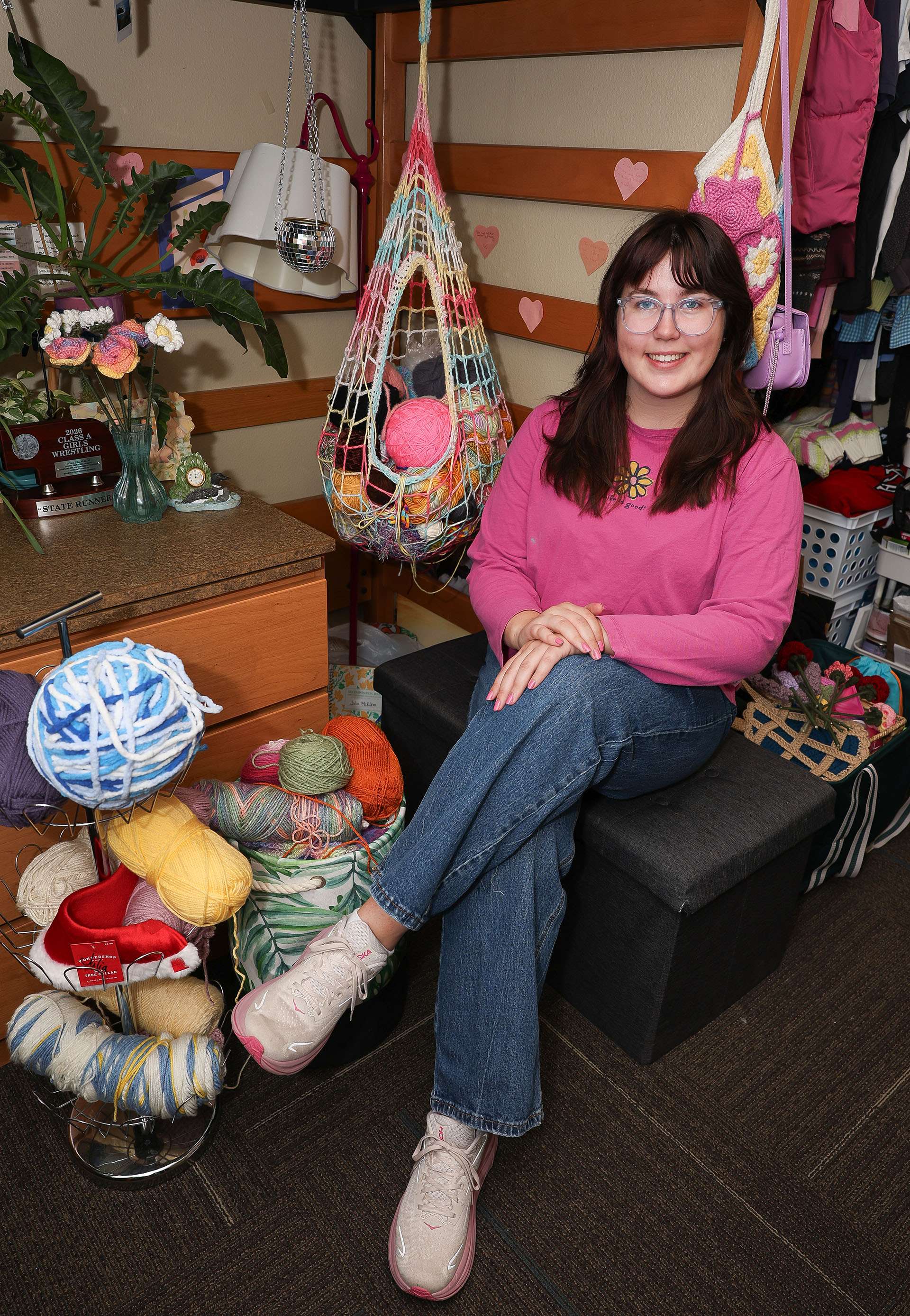 UNK junior Julia McKlem started crocheting about two years ago, adding another craft to the list of artsy activities she enjoys. The K-12 art education major has since created a crochet club on campus, bringing together students who share similar interests. (Photo by Erika Pritchard, UNK Communications)