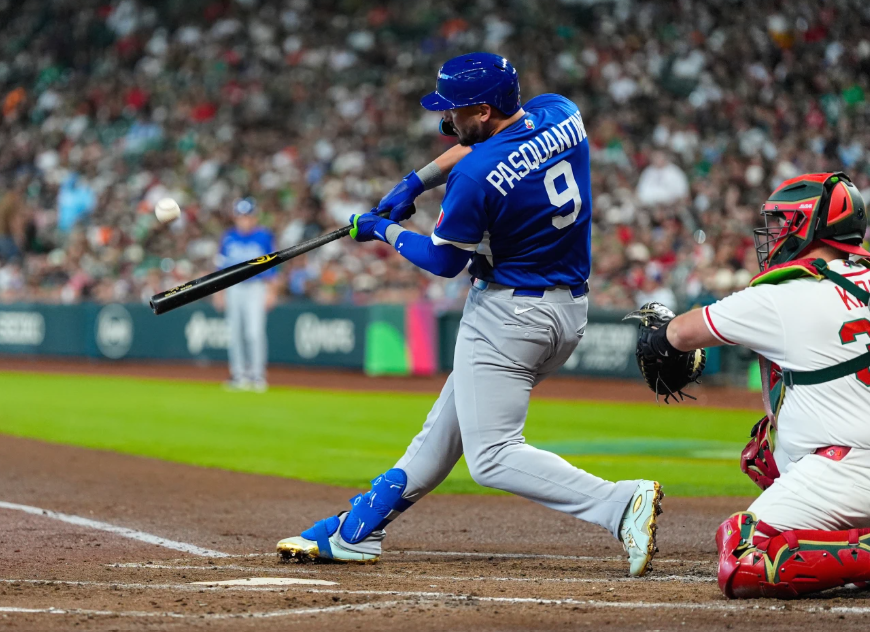 Italy first baseman Vinnie Pasquantino hits a home run in the second inning of a World Baseball Classic game against Mexico, Wednesday, March 11, 2026, in Houston. (AP Photo/Ashley Landis)