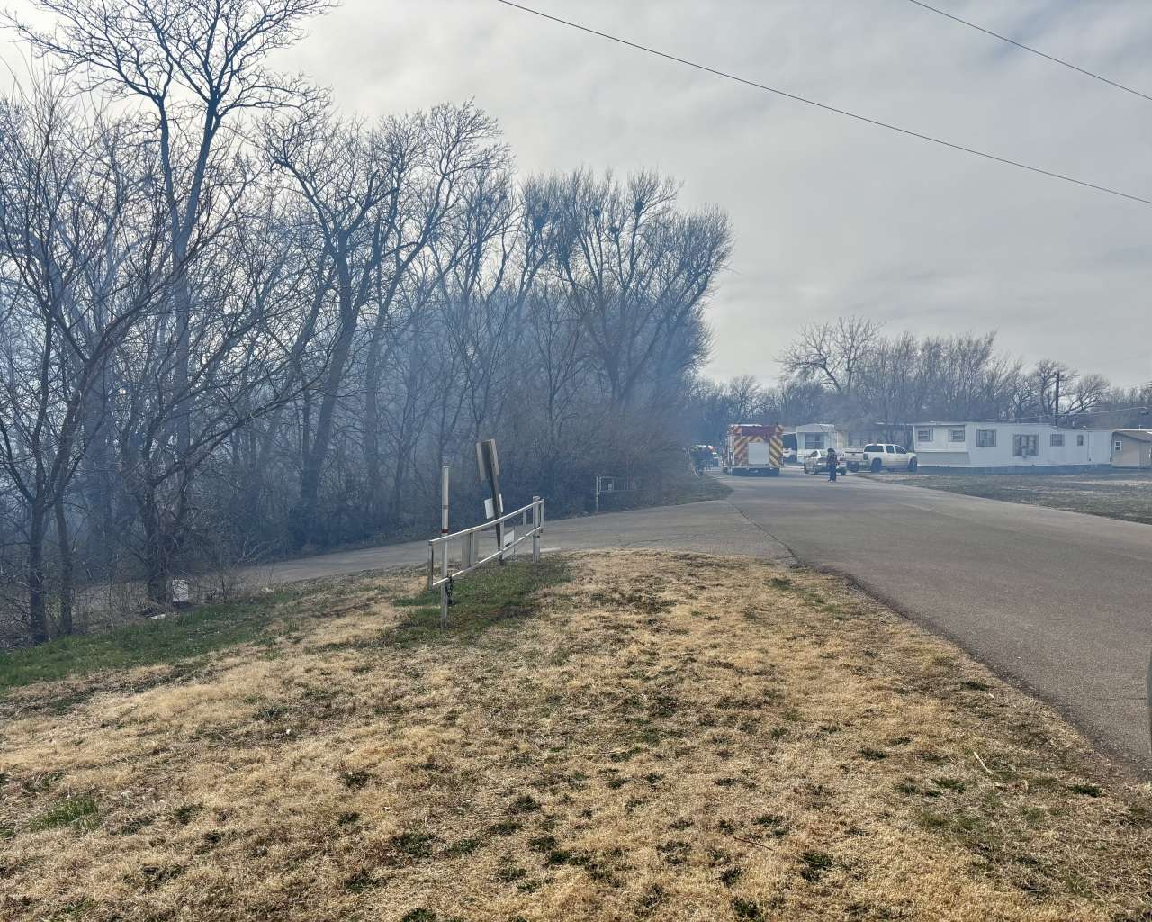 Fire crews responding to a fire south of Meadow Arces Park in Hays. Photo by Tony Guerrero/Hays Post