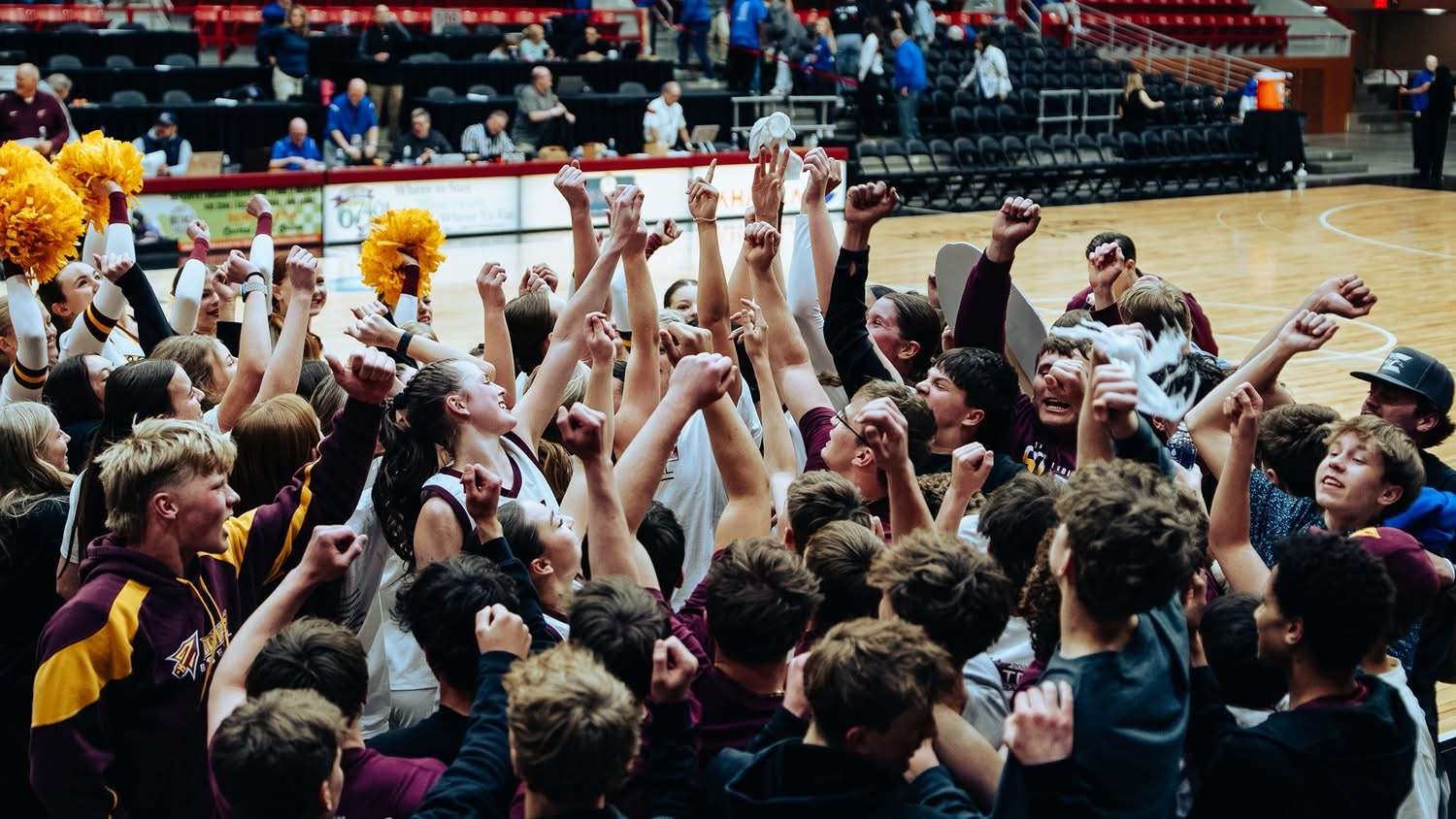 Fans swarm Hays High players after the Indians’ state quarterfinal victory. Photo courtesy of Brody Burns.