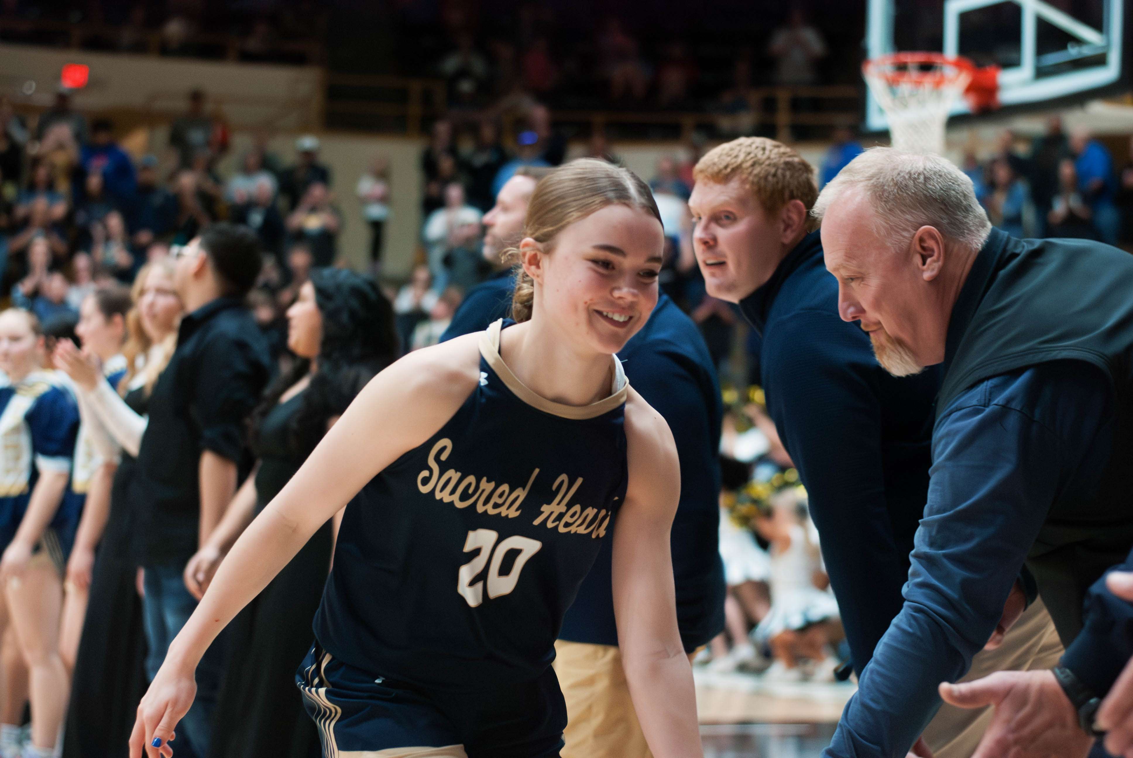 Emmy Lee excitedly checks into the 2A state championship game. Photo by Trae Toelle.