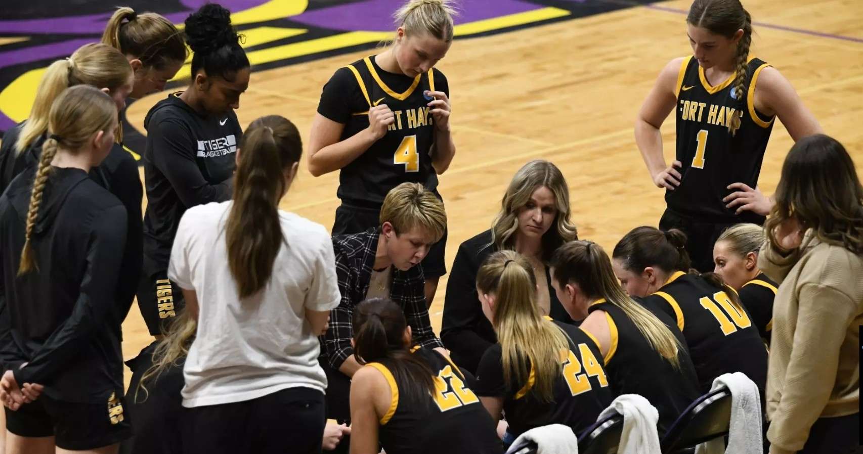Fort Hays State women's basketball coach Talia Kahrs draws up a play in the huddle during a timeout of the NCAA II Central Regional semifinal game against Concordia-St. Paul on Saturday, March 14, 2026 in Mankato, Minn. (FHSU Athletics/Ryan Prickett)