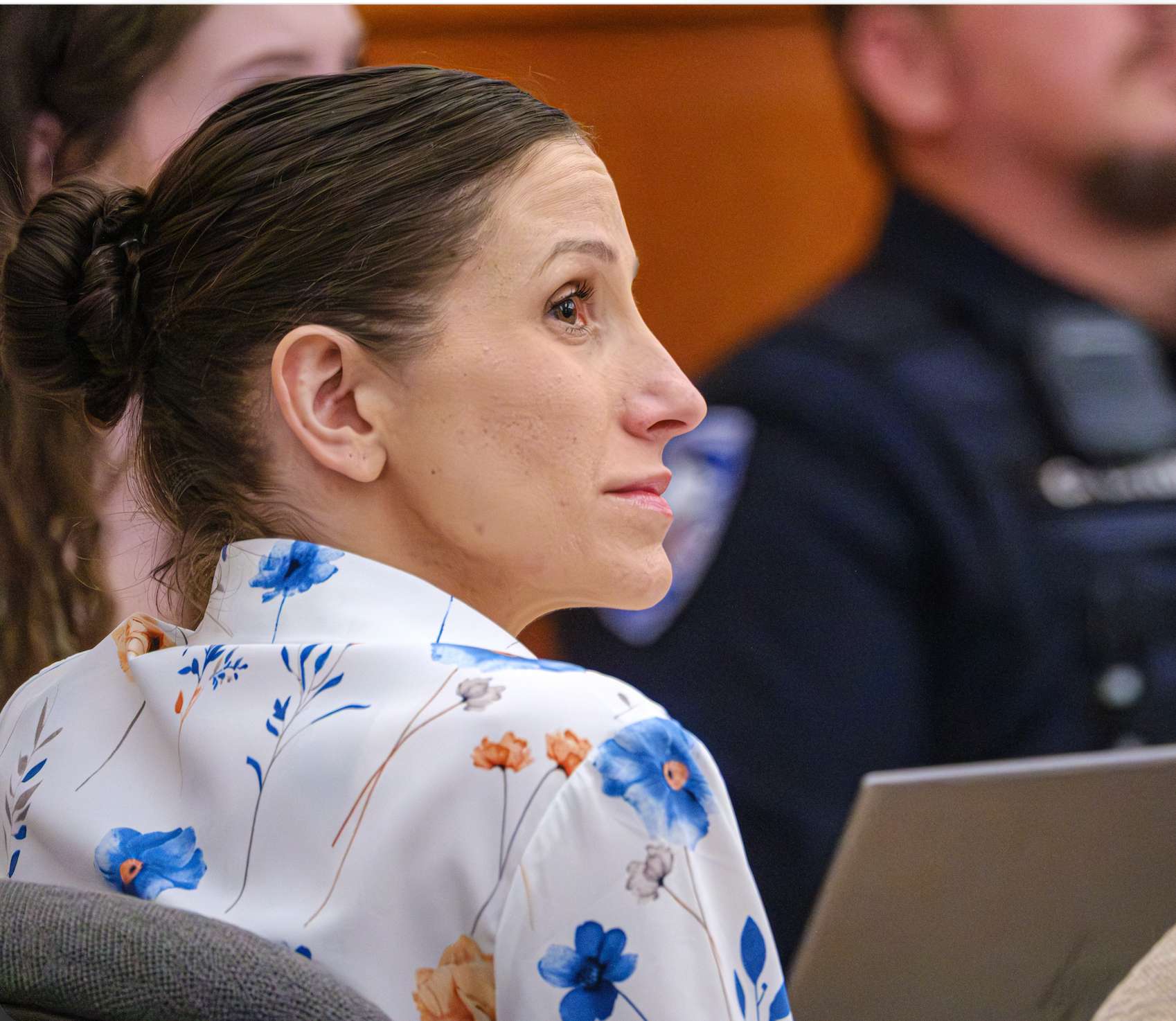 Defendant Kouri Richins, left, accused of poisoning her husband in March 2022, listens to closing arguments in Third District Court, Monday, March 16, 2026, in Park City, Utah. (David Jackson/Pool Photo via AP)
