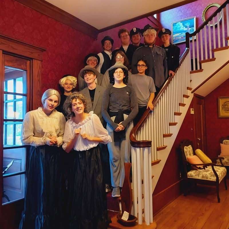Cast members of the SHS production of “Arsenic and Old Lace” visited the Goertz House in Newton which was the inspiration for the setting of the show. They are: (front to back, left to right) Jenna Conard, Kate McGlyn, Natalie Williams, James McGlynn, William Wilson, Maggie Madden, Caitlyn Mullins, Kayla Rincon, Daniel Bates, Cooper Pieplow, Shepard Levy, Chris Childs, and Latham Kizzar. (Photo courtesy of Sterling H.S. Theatre)