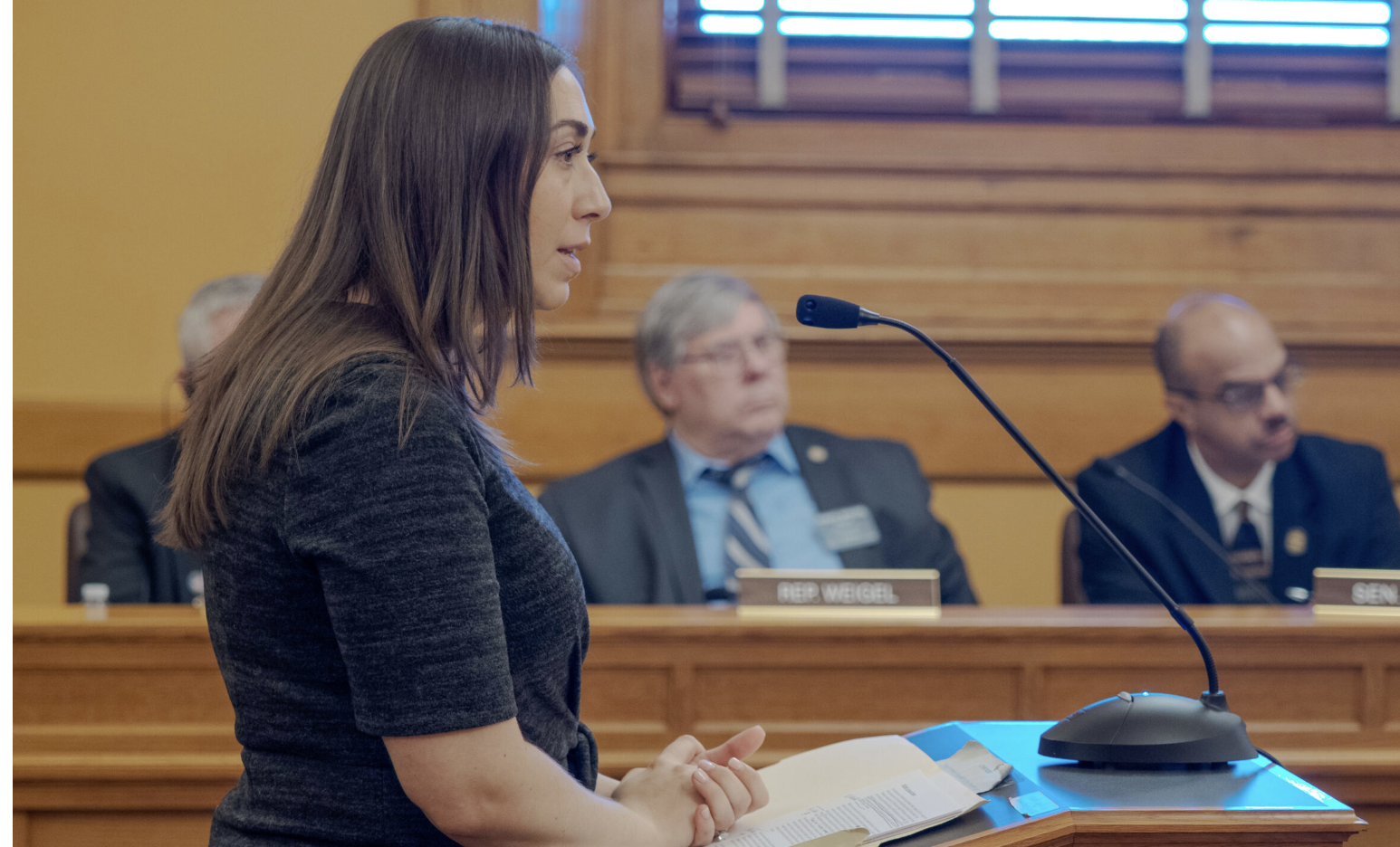 Kelly VanZwoll of the Kansas Bankers Association tells lawmakers during a March 16, 2026, hearing at the Statehouse in Topeka that fighting fraud is a “team sport.” (Photo by Sherman Smith/Kansas Reflector)