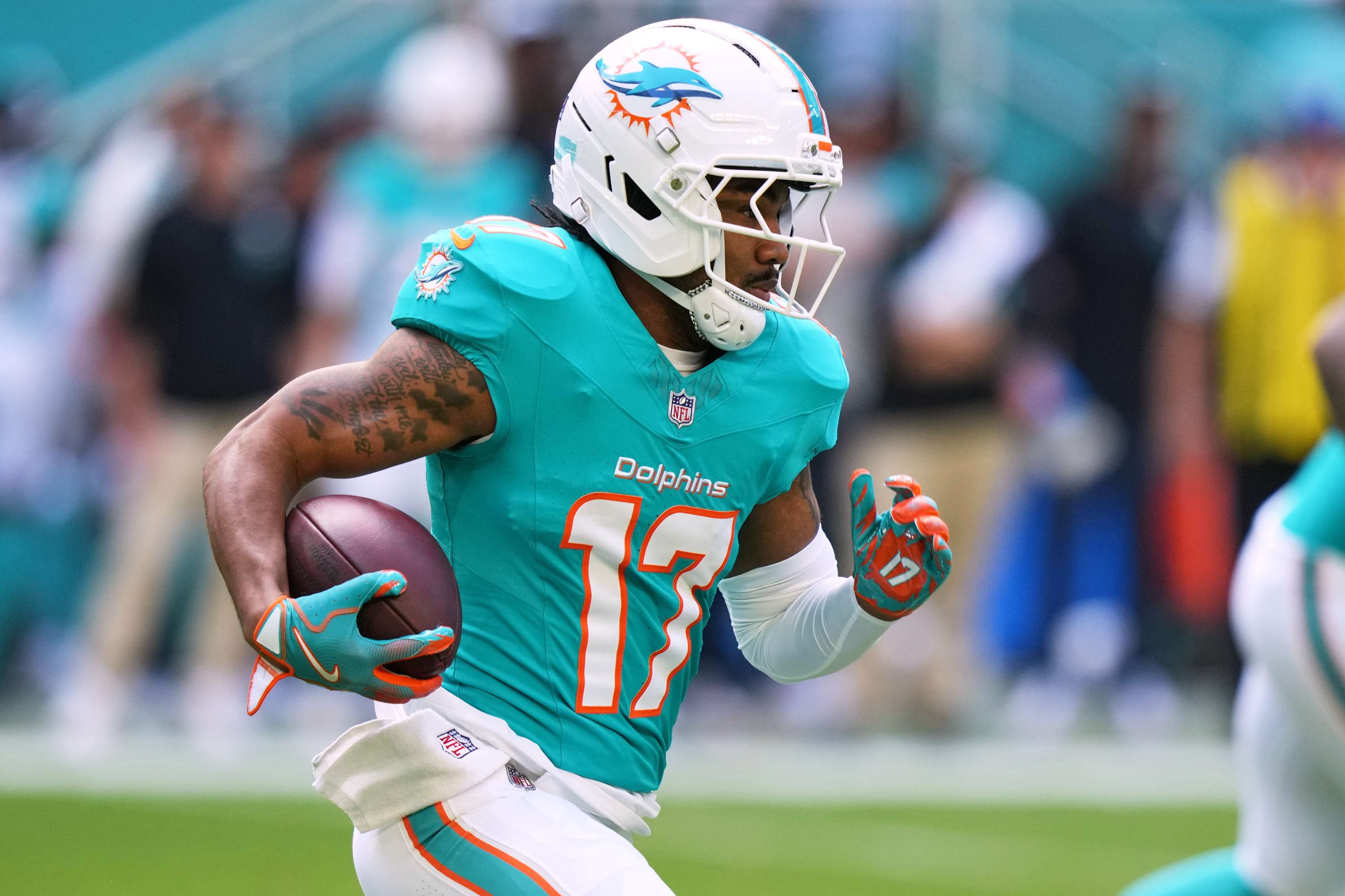 FILE - Miami Dolphins wide receiver Jaylen Waddle (17) runs during the first half of an NFL football game against the Tampa Bay Buccaneers, Dec. 28, 2025, in Miami Gardens, Fla. (AP Photo/Lynne Sladky, File)