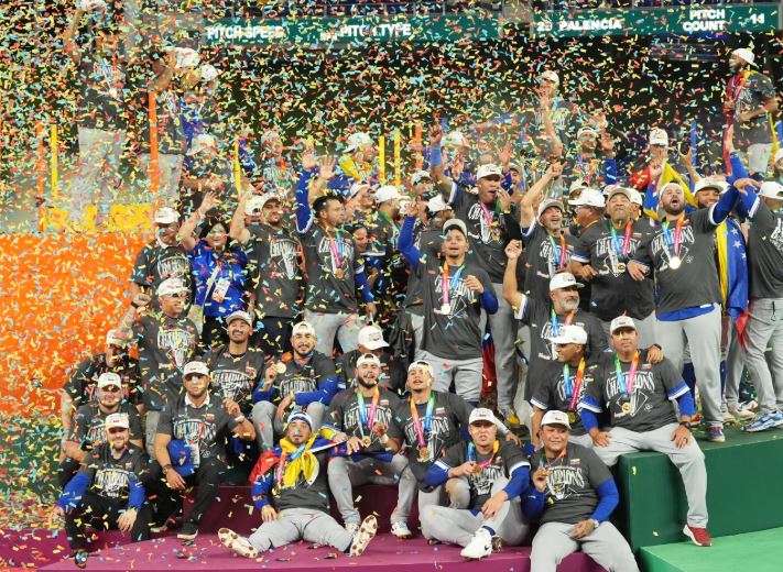 The Venezuela team celebrates after defeating the United States in the championship game of the World Baseball Classic, Tuesday, March 17, 2026, in Miami. (AP Photo/Rebecca Blackwell)