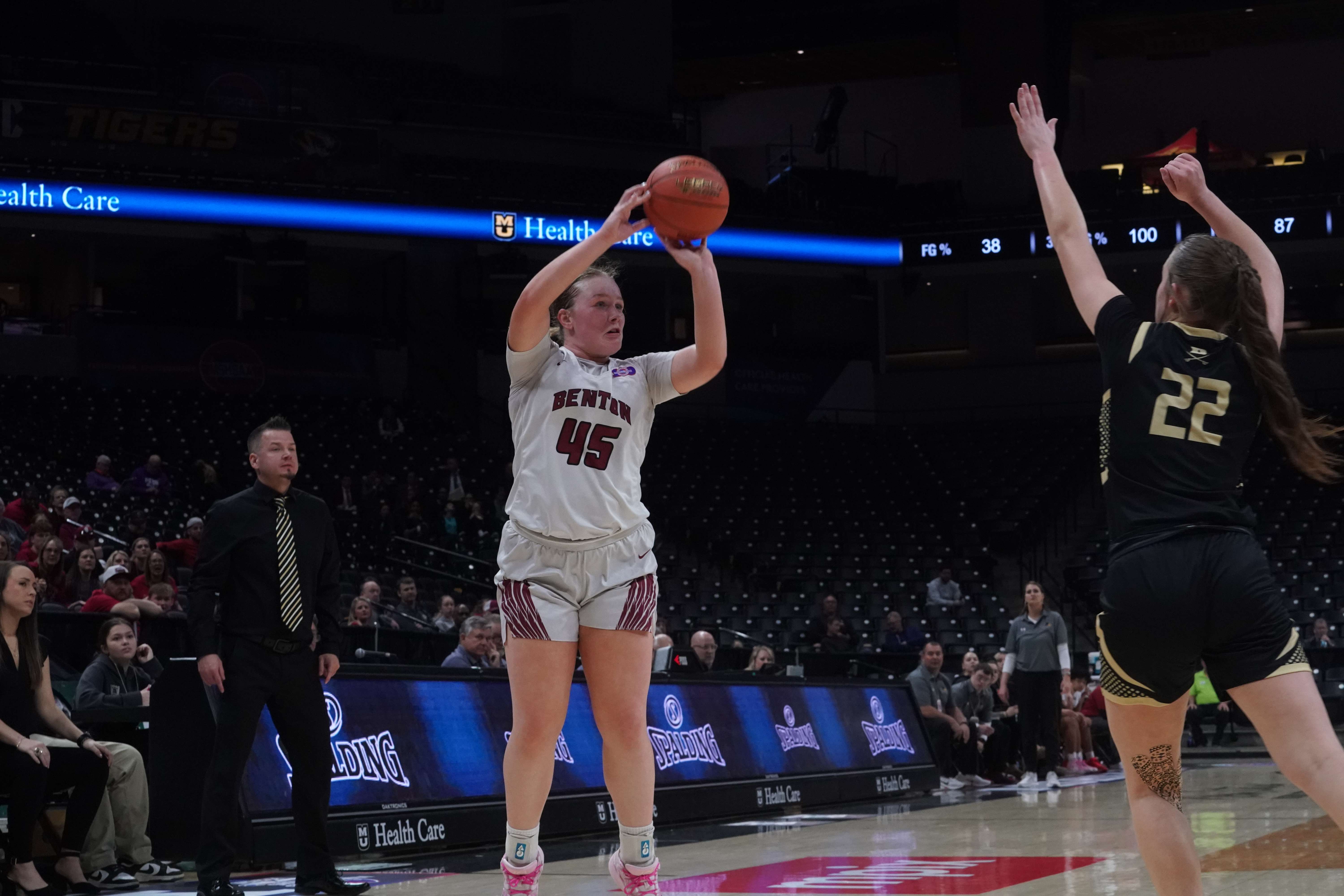 Klarabelle Turner shoots a three against Doniphan.  Turner finished with eight points and 12 rebounds/ Photo courtesy of Clifton Grooms