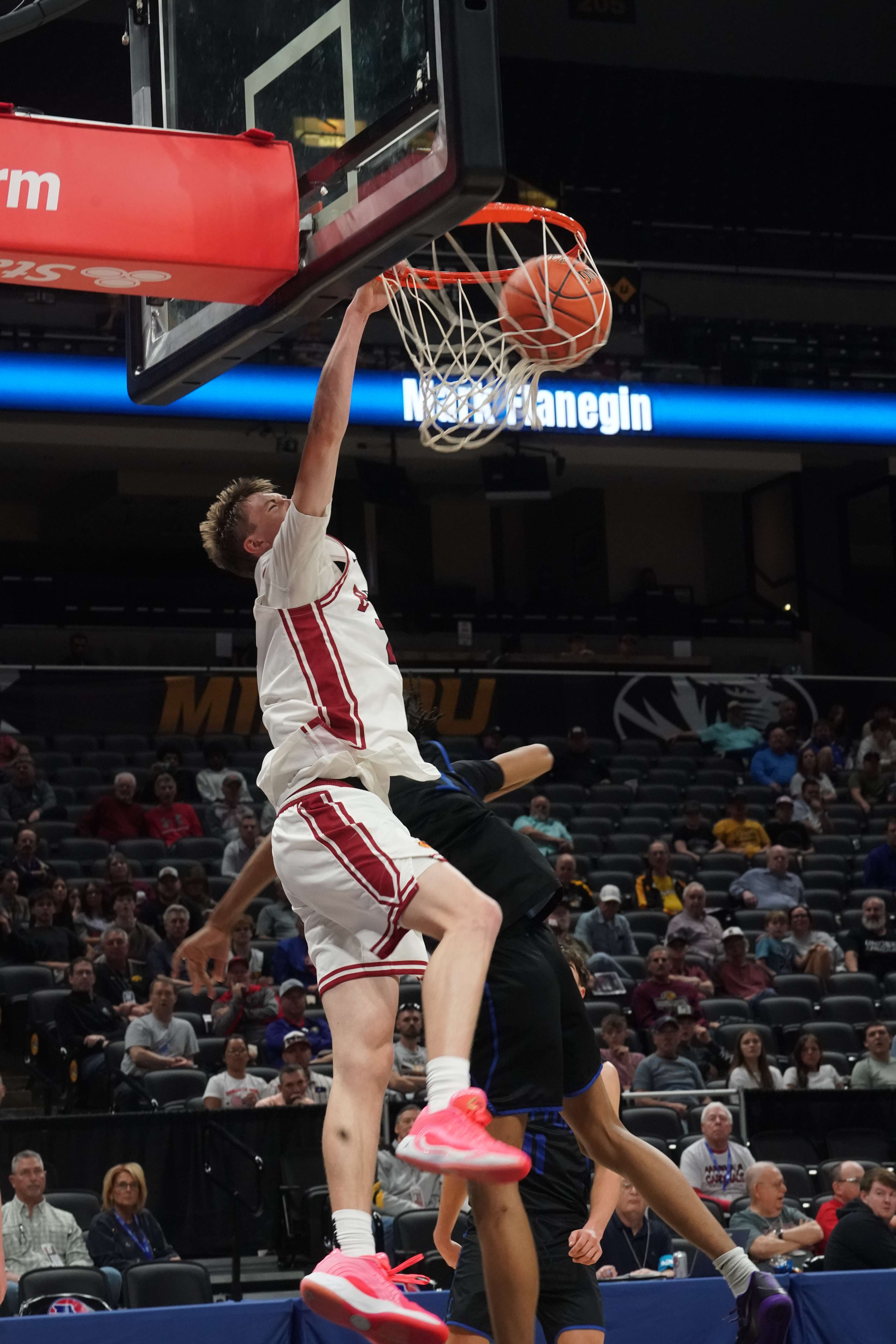Lincoln Goodwin goes up for a dunk against Clayton.&nbsp; Goodwin had 15 of his game leading 28 points in the first half/ Photo courtesy of Clifton Grooms