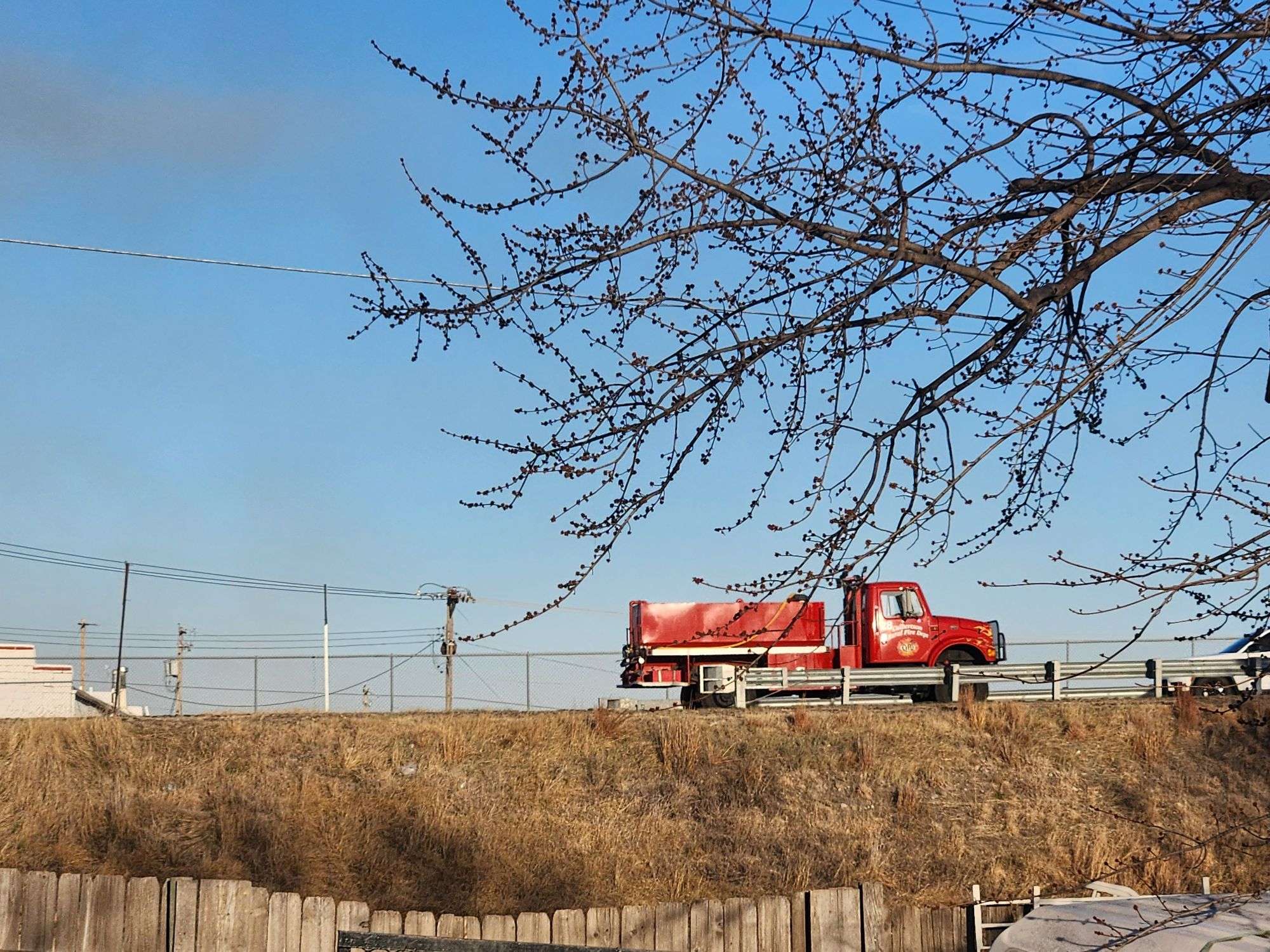 Several area rural fire departments responded to a vegetation fire 4 miles south of McCook on Saturday. (Natasha Watts)