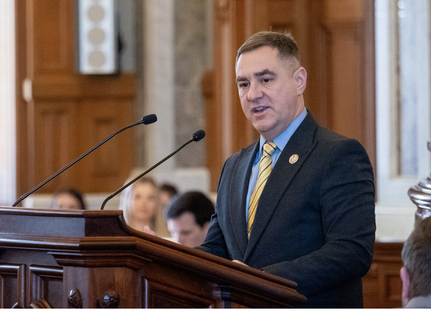 Rep. Pat Proctor, speaking here at a Feb. 12, 2026 hearing, spoke against a bill putting stricter regulations on pharmacy benefit managers because it adds a $10.50 dispensing fee to prescriptions. (Photo by Sherman Smith/Kansas Reflector)