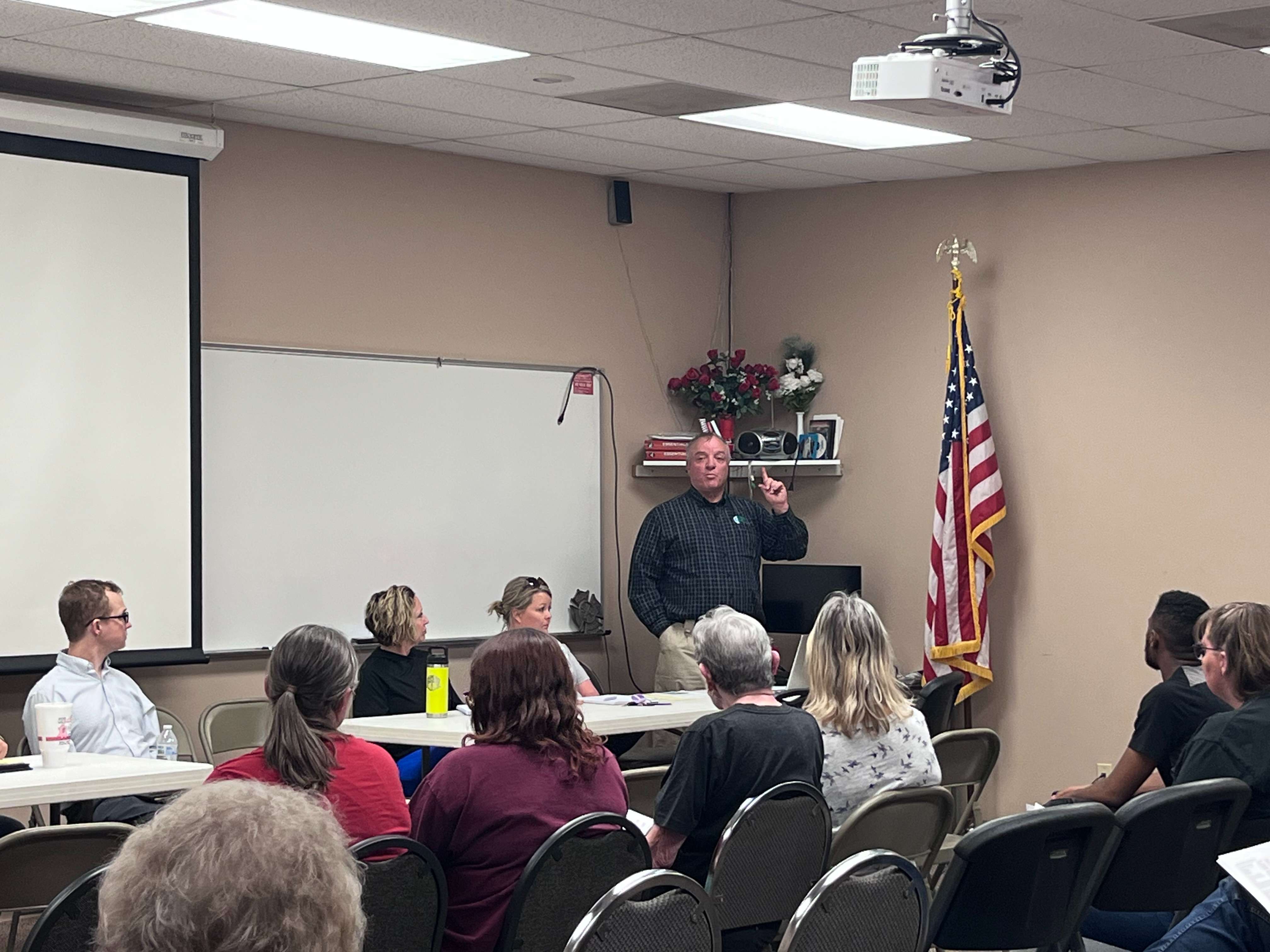 Curt Bigge speaks to residents of Sundowner West Mobile Home Park rural Saline County about the next steps moving forward after previous owner, Scott Kolling loses ownership - Photo by Nicolas Fierro