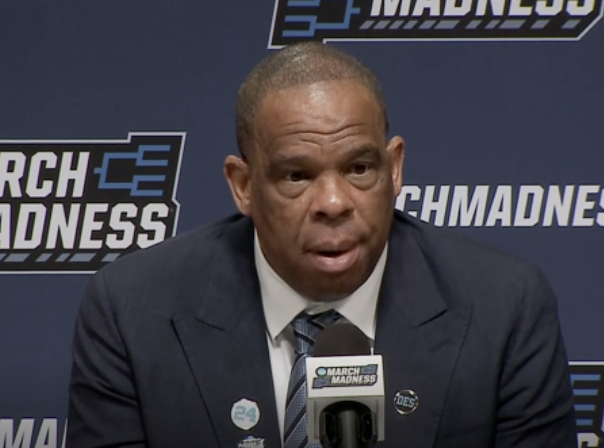 Hubert Davis speaking to the media following the team's NCAA tournament overtime loss to VCU-image from UNC video