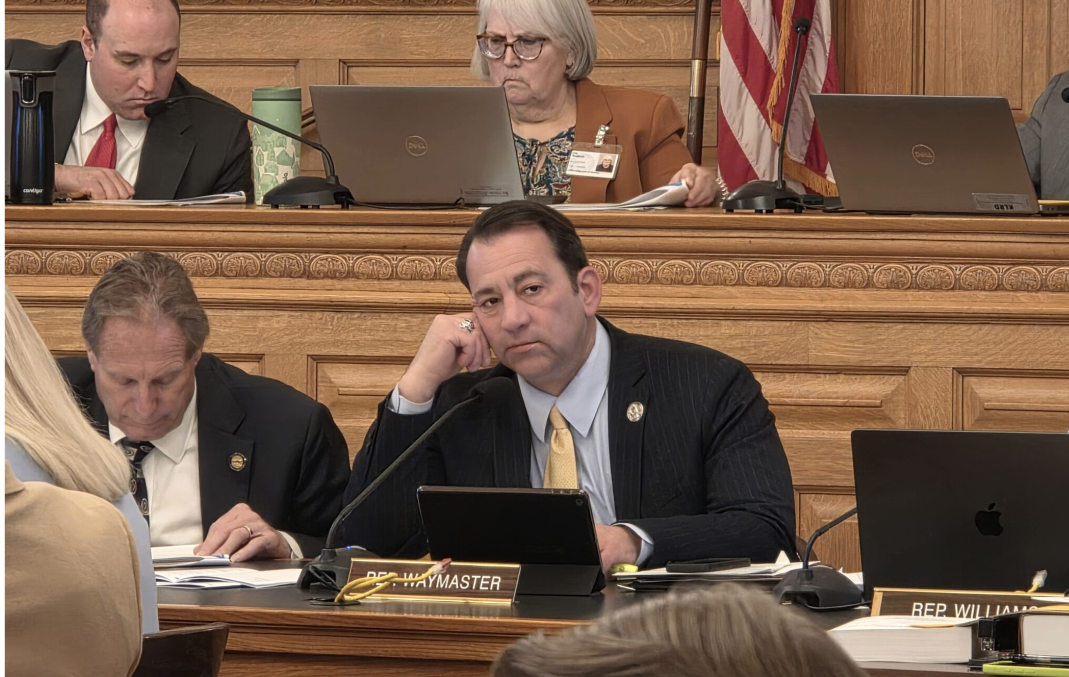  Rep. Troy Waymaster, R-Bunker Hill, agrees with Senate negotiators to place in the Kansas Legislature's new budget bill a 1% across-the-board salary increase for about 35,000 executive branch and public university staff. He argues the state should focus new investments on the state's most underpaid workers. He is seen here during a Jan. 14, 2026, meeting. (Photo by Morgan Chilson/Kansas Reflector)