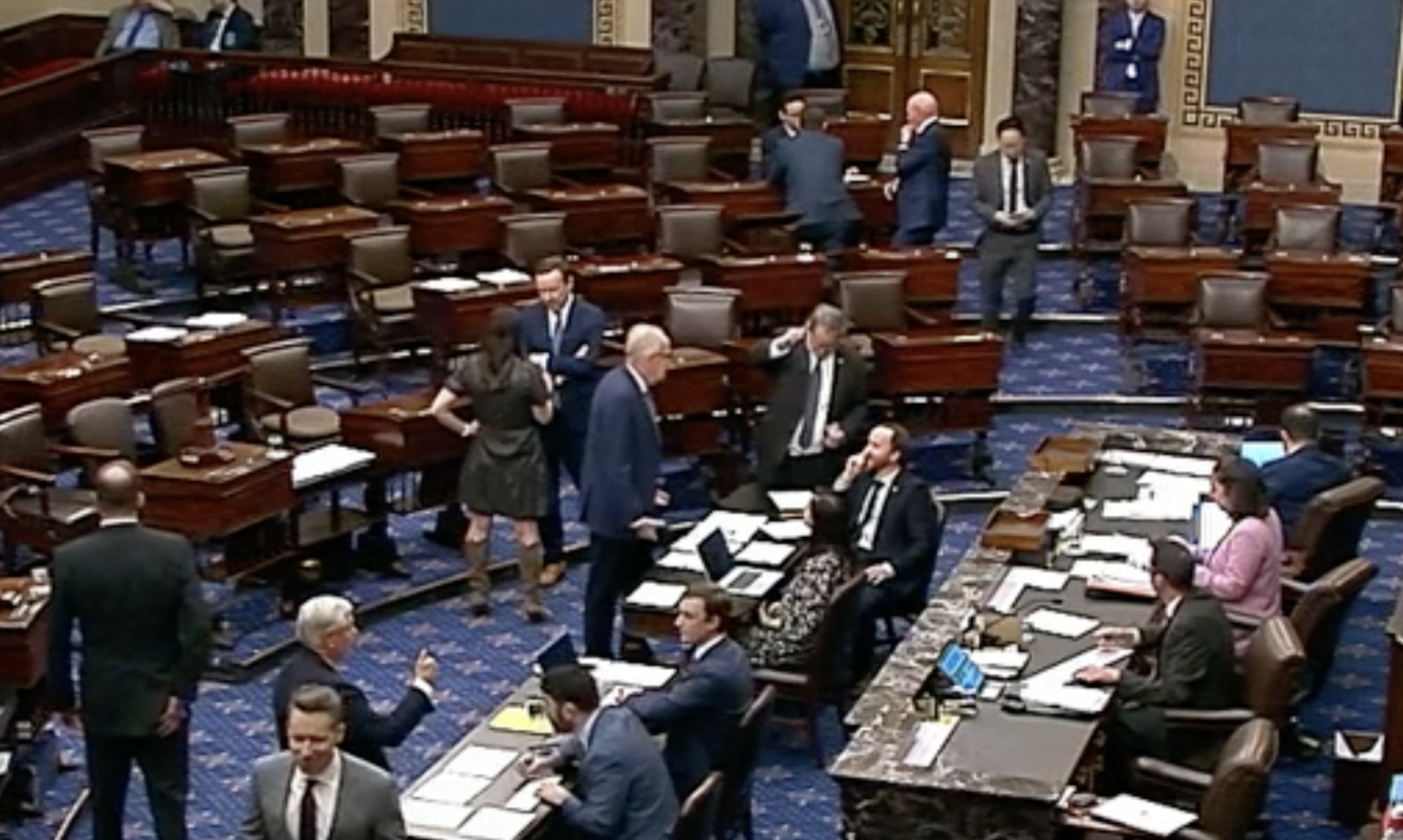 Kansas U.S. Senator Jerry Moran (center) during the vote count early Friday-image courtesy CSPAN
