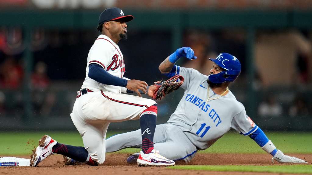 Atlanta Braves' Ozzie Albies (1) celebrates his solo homer against the Kansas City Royals during the first inning of an opening-day baseball game, Friday, March 27, 2026, in Atlanta. (AP Photo/Mike Stewart)