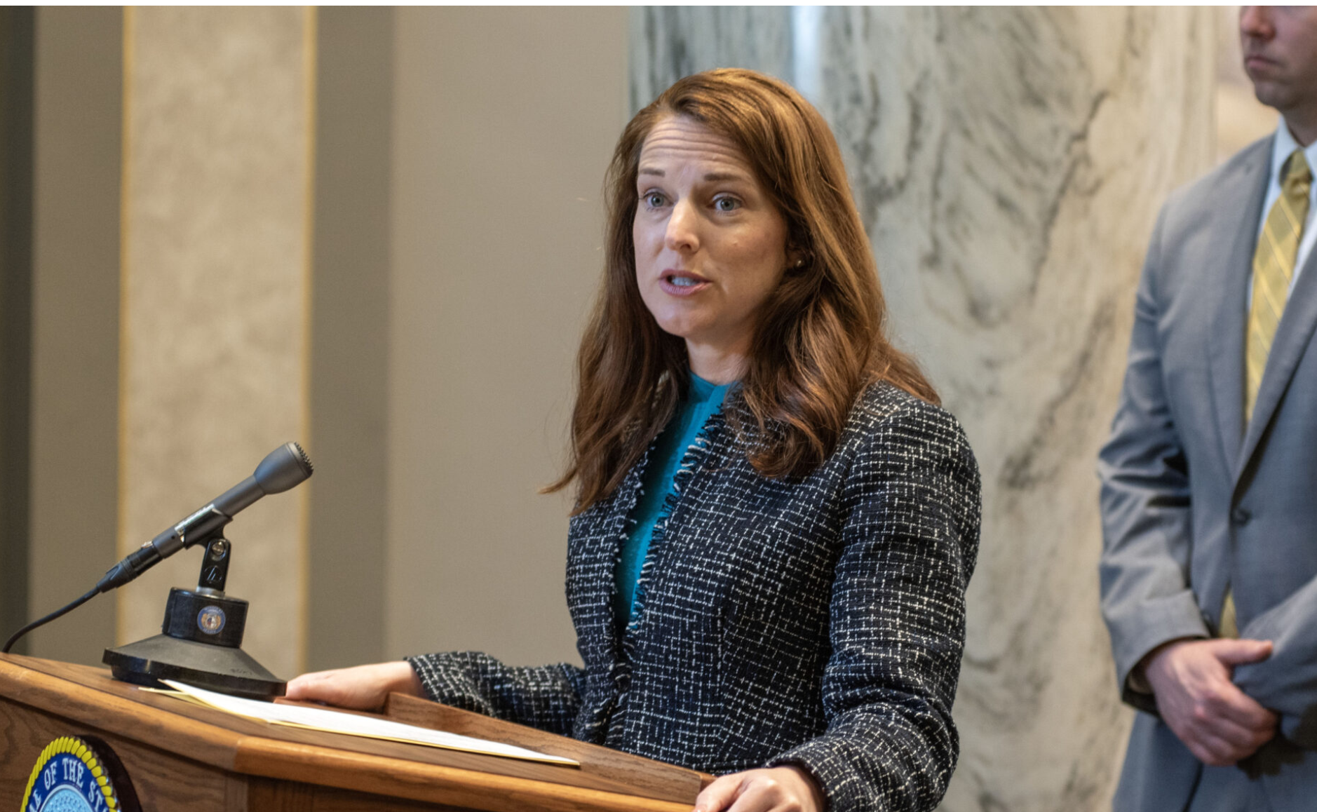  State Sen. Maggie Nurrenbern, a Democrat from Kansas City, speaks at a mid-session press conference earlier this month. The Missouri Senate unanimously approved her bill outlining a framework for assisted outpatient mental health treatment. Similar legislation in the House is sponsored by Republican state Rep. Carolyn Caton of Blue Springs and Democratic state Rep. Aaron Crossley of Independence (Annelise Hanshaw/Missouri Independent).