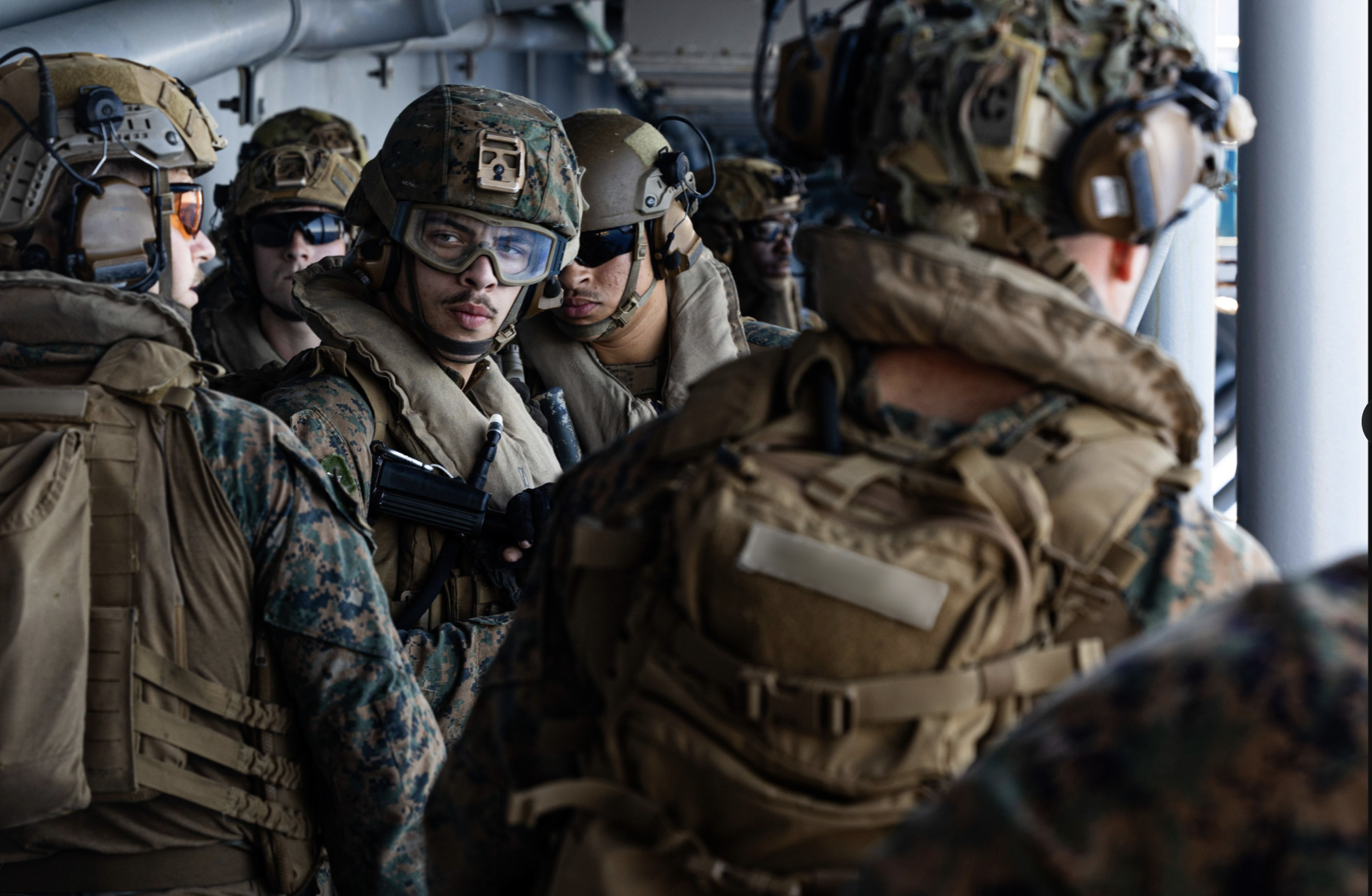 U.S. Sailors and Marines aboard USS Tripoli (LHA 7) arrived in the U.S. Central Command area of responsibility. The America-class amphibious assault ship serves as the flagship for the Tripoli Amphibious Ready Group / 31st Marine Expeditionary Unit composed of about 3,500 Sailors and Marines in addition to transport and strike fighter aircraft, as well as amphibious assault and tactical assets. Photo U.S. Central Command