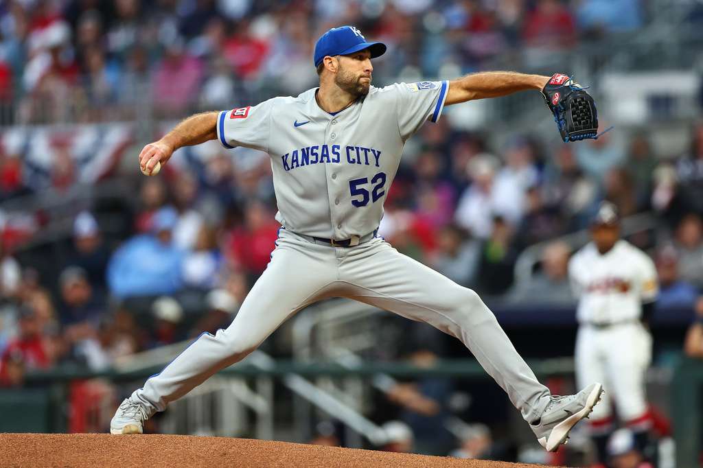 Kansas City Royals pitcher Michael Wacha (52) delivers in the first inning of a baseball game against the Atlanta Braves, Saturday, March 28, 2026, in Atlanta. (AP Photo/Colin Hubbard)