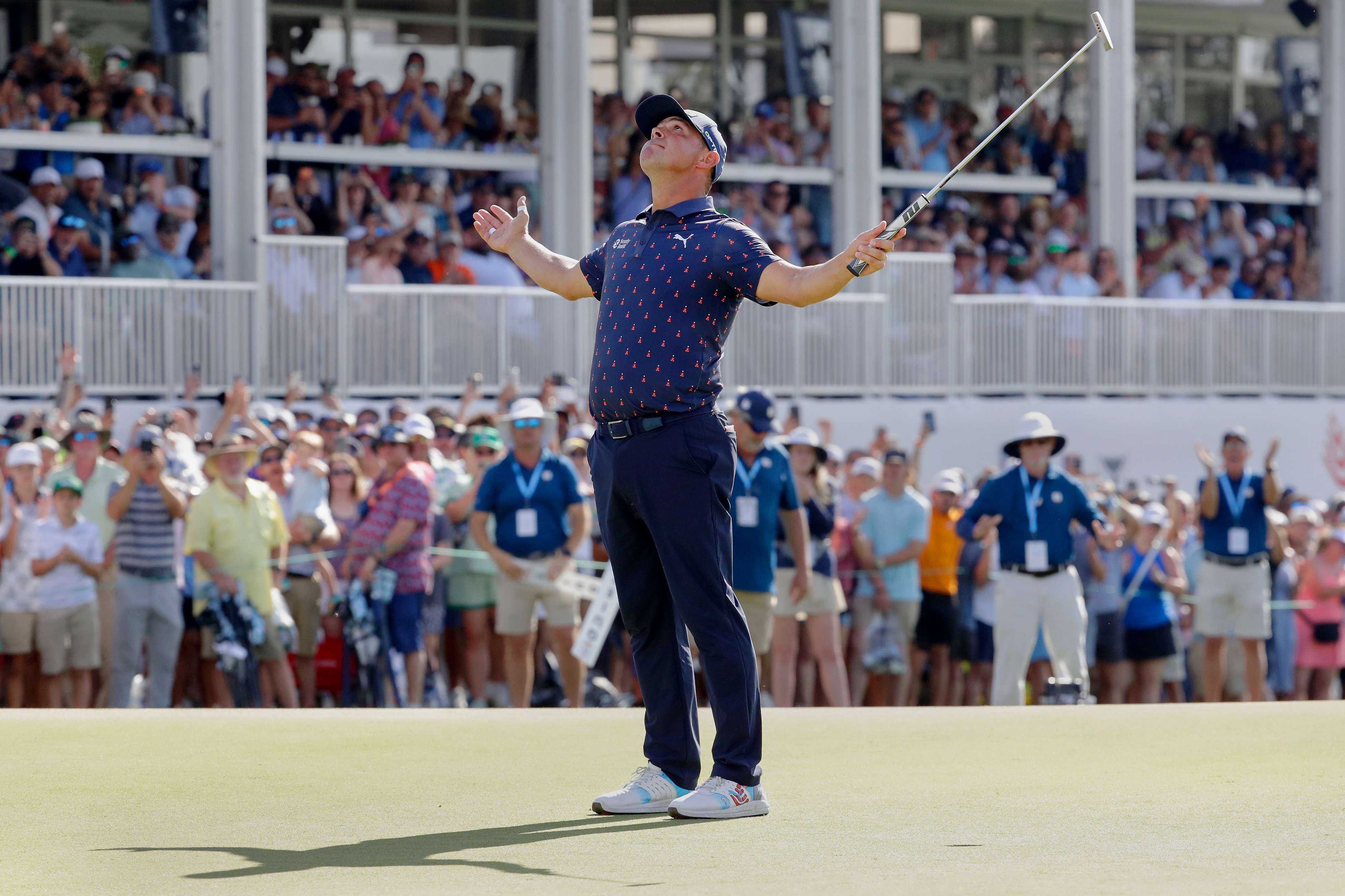 Gary Woodland celebrates after sinking his final putt on the 18th green to win the Texas Children's Houston Open golf tournament Sunday, March 29, 2026, in Houston. (AP Photo/Michael Wyke)