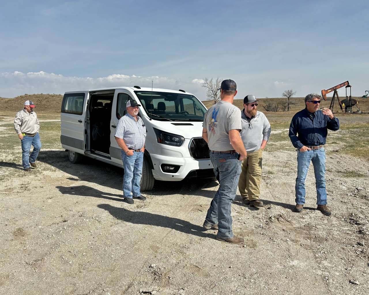 Ellis County Commissioners with the Ellis County Public Works Department at the site of a culvert during the 2026 Ellis County Road Tour. Photo by Tony Guerrero/Hays Post