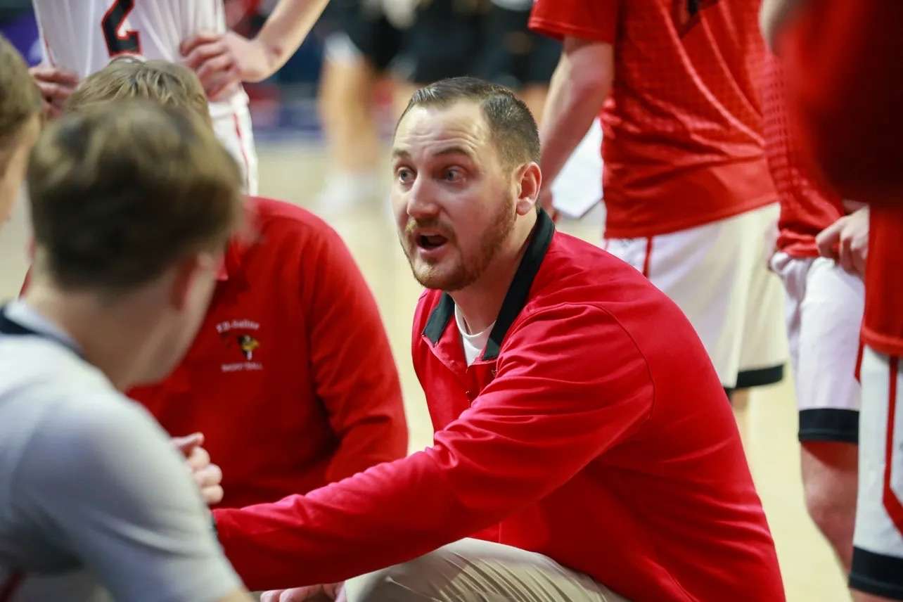 Marty Wendel coaches up his Cardinals during a boys basketball game. Photo courtesy of Salina South HS.
