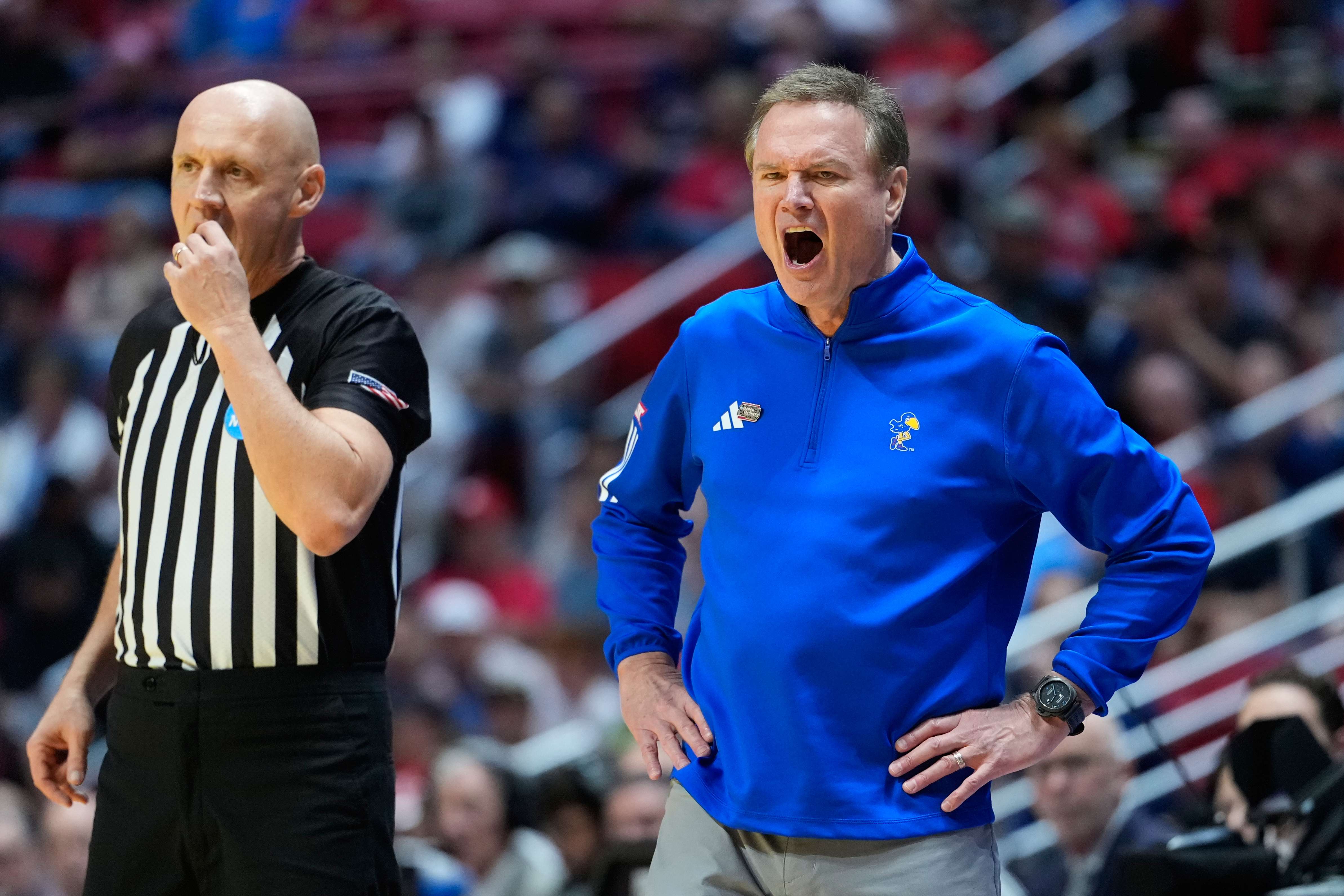 Kansas head coach Bill Self yells towards the court against St. John's during the first half of a game in the second round of the NCAA college basketball tournament Sunday, March 22, 2026, in San Diego. (AP Photo/Mark J. Terrill)