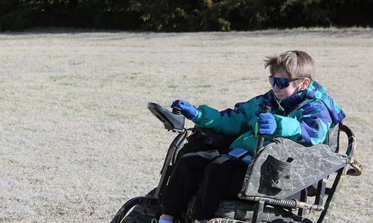 Brody goes into high gear in his trakchair at his home in Victoria. Photo by Cristina Janney/Hays Post