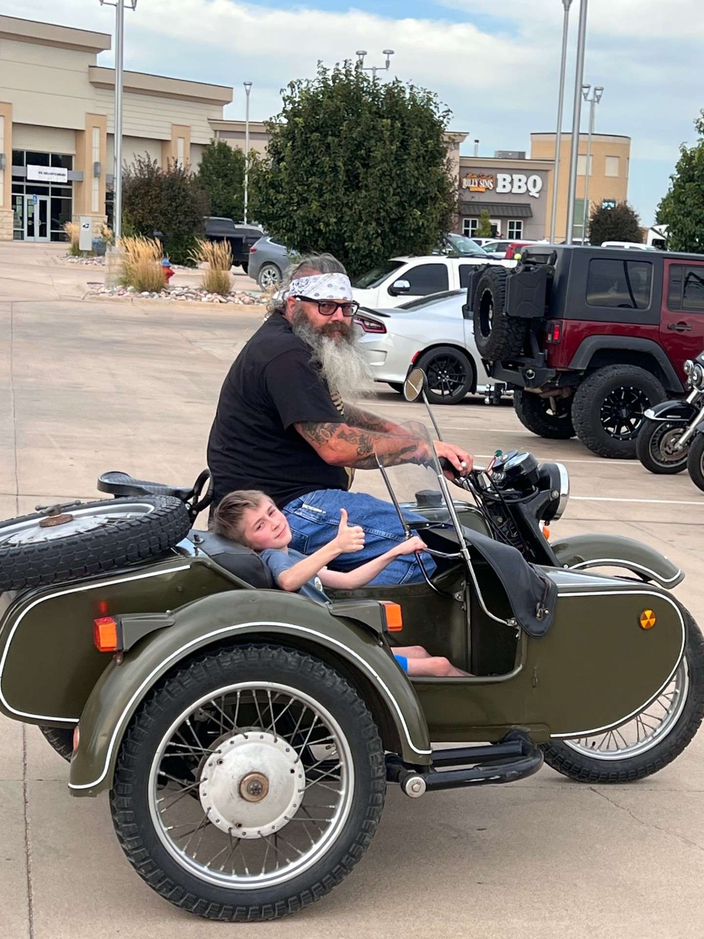 Brody on a motorcycle ride with another Mile Monster. Courtesy photo