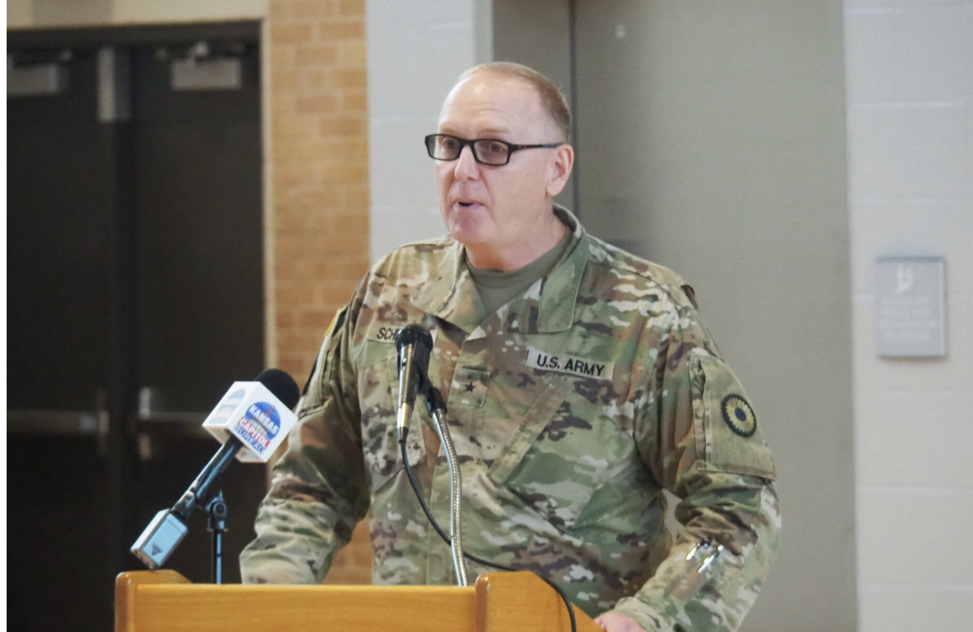 Brig. Gen. Paul Schneider, adjutant general for the Kansas National Guard, celebrates the restoration of an armory in Kansas City, Kansas, and a program with classroom space in the building offering science instruction to fifth-grade students. The program is also hosted in Topeka, Wichita, Salina and Manhattan. (Photo by Tim Carpenter/Kansas Reflector) KANSAS
