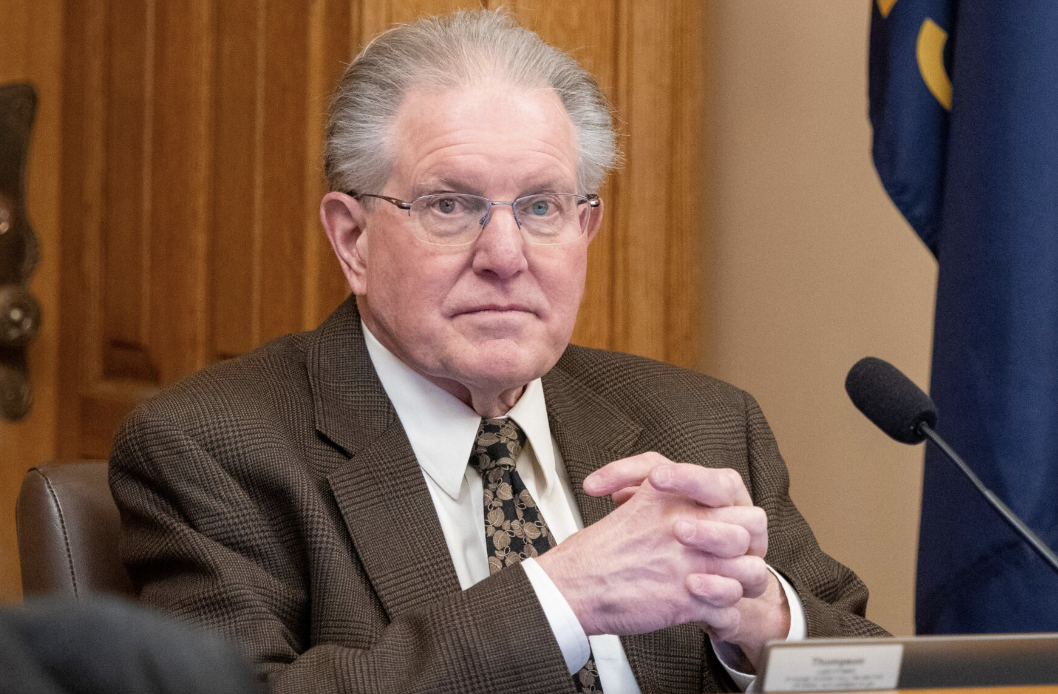  Sen. Mike Thompson, R-Shawnee, presides over a Feb. 2, 2026, legislative hearing. Thompson pushed false claims during a debate on legislation to end in-state college tuition rates for immigrants. (Photo by Sherman Smith/Kansas Reflector)