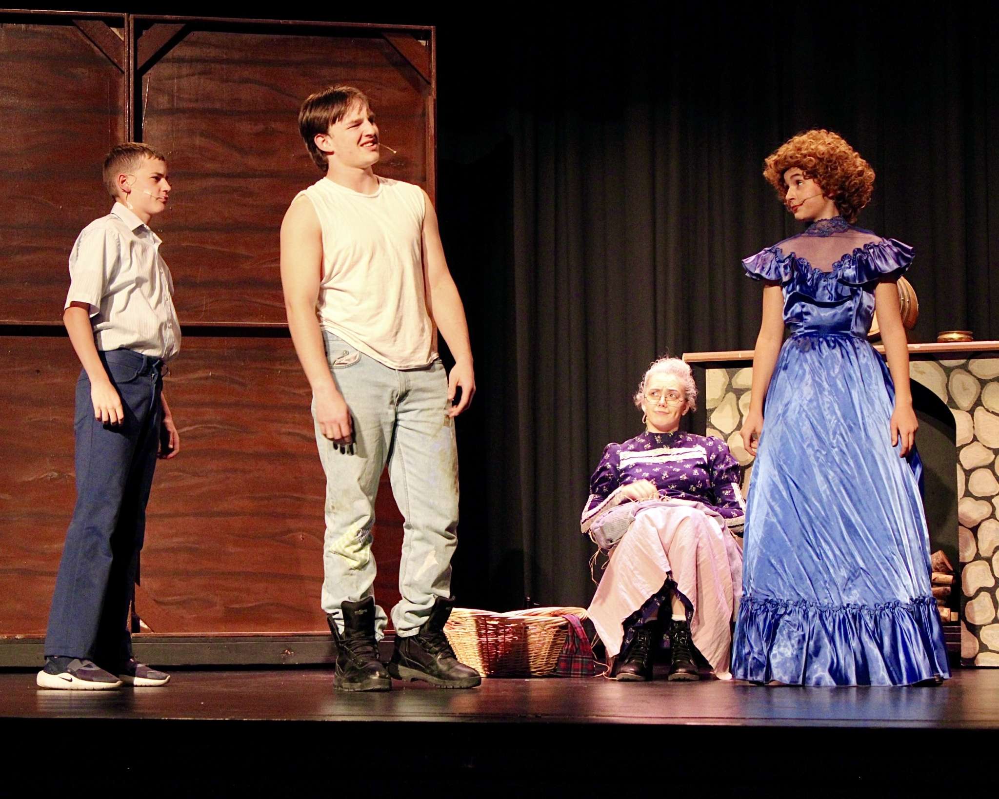 Several characters on stage for Thomas More Prep-Marian's "The Beverly Hillbillies" production. Photo by Tony Guerrero/Hays Post