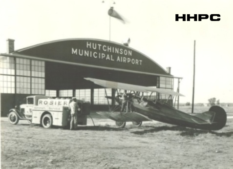 Hutchinson Municipal Airport - Rowland Wells Hangar - c. 1930 (with Beechcraft Travel Air Biplane Being Filled by Rosier Fuel Truck). Courtesy of the Conard-Harmon Collection.