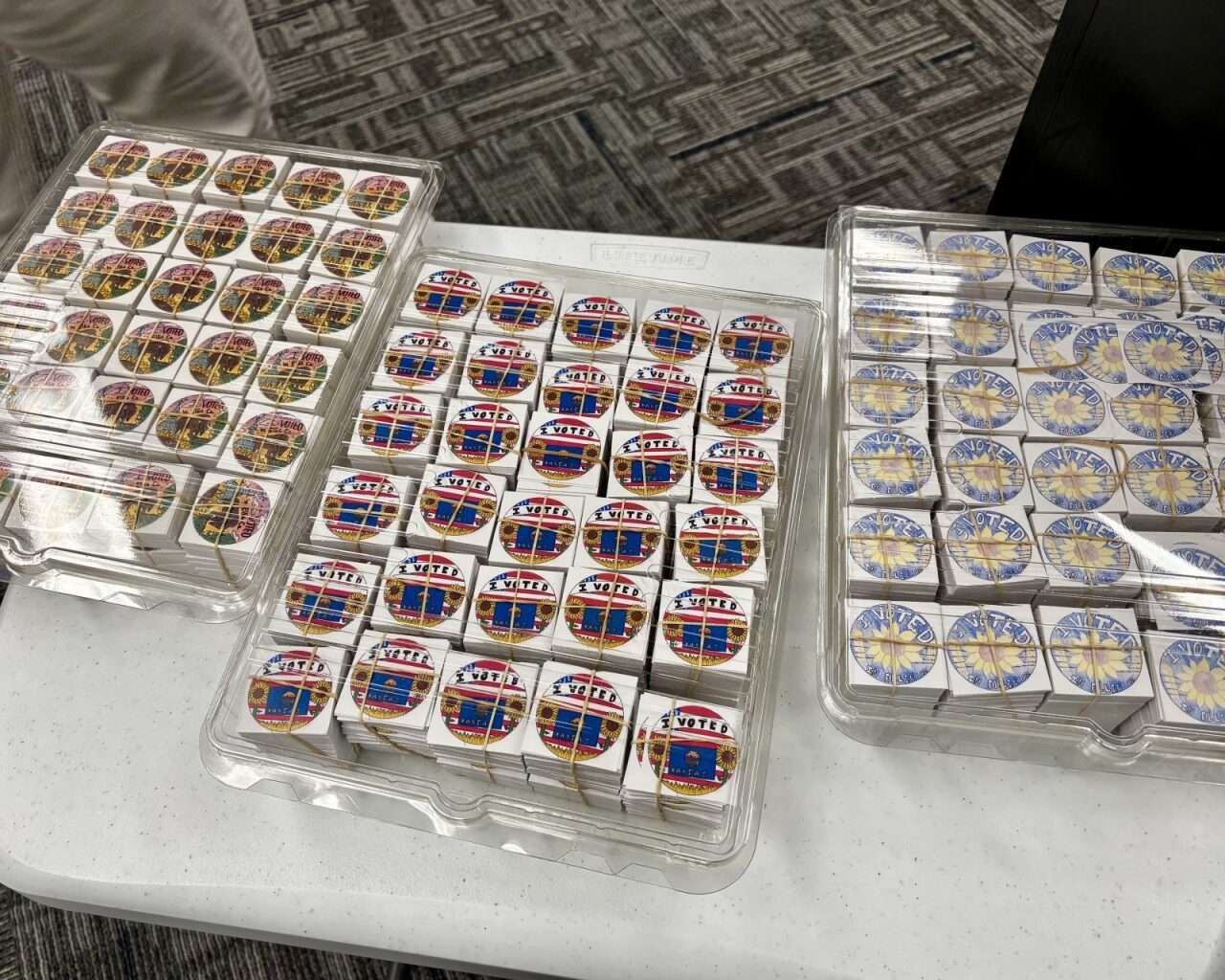 A total of 25,000 “I Voted” stickers have already been produced across all three winning designs. Photo by Tony Guerrero/Hays Post