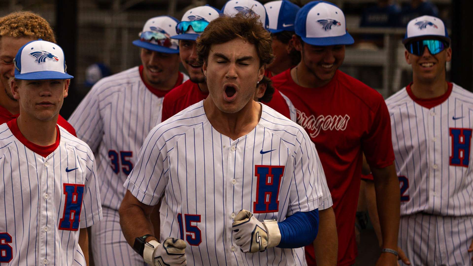 Cru Huenfeld reacts after hitting a go-ahead three-run home run in the Blue Dragons' come-from-behind 9-7 victory over Barton in Game 1 of a doubleheader on Thursday at Hobart-Detter Field. (Sydney Holzrichter/Blue Dragon Sports Information)