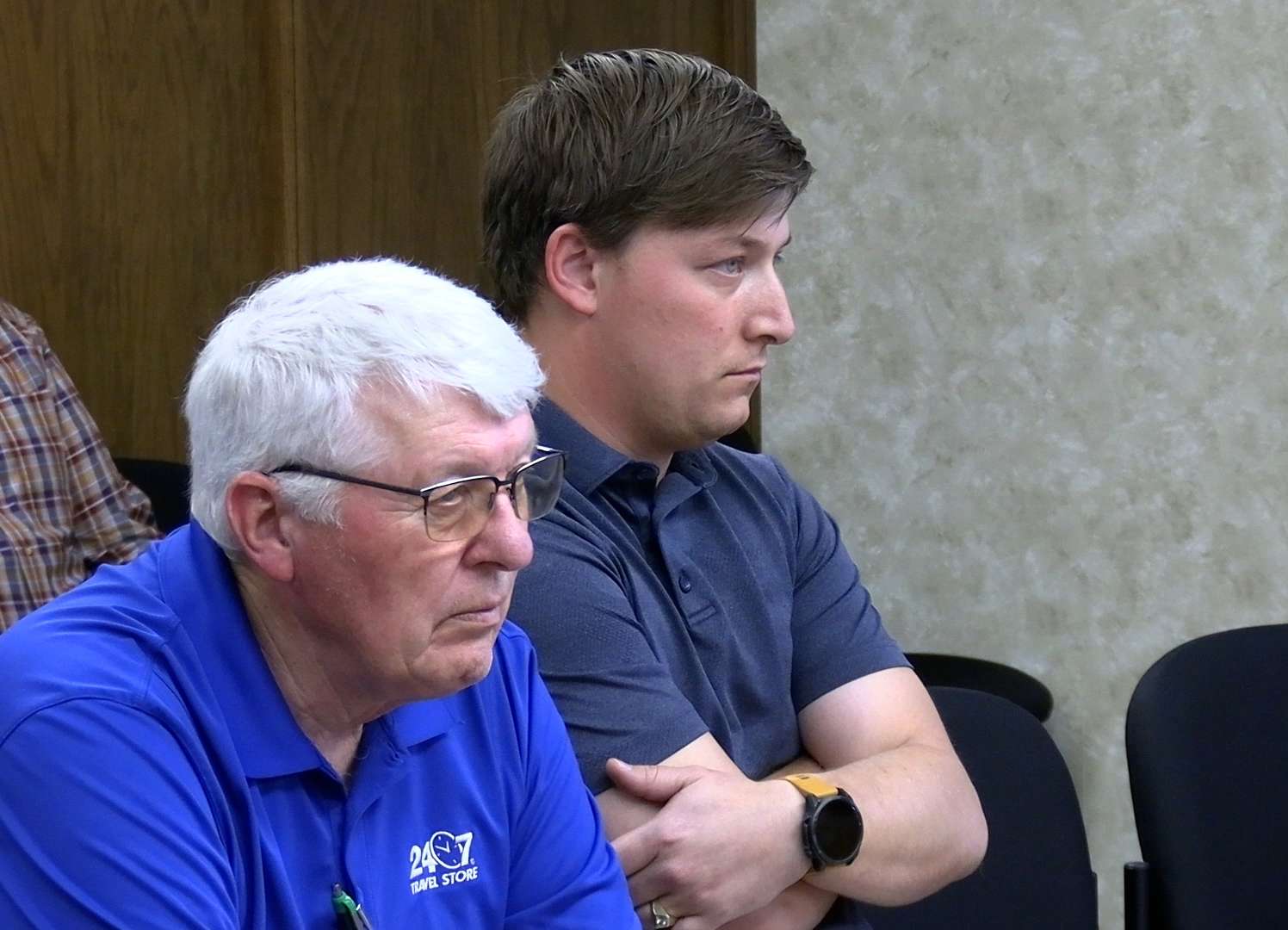 Mark and Ted Augustine, Triplett, Inc., Salina, listen to the discussion on Thursday about their planned construction of a 24/7 Travel Plaza north of I-70. Becky Kiser/Hays Post